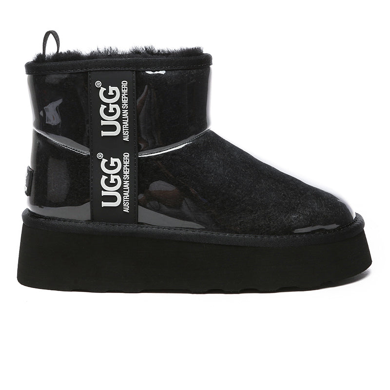 Black transparent platform UGG boots by EverUgg showing their clear, chunky sole and sleek boot design.
