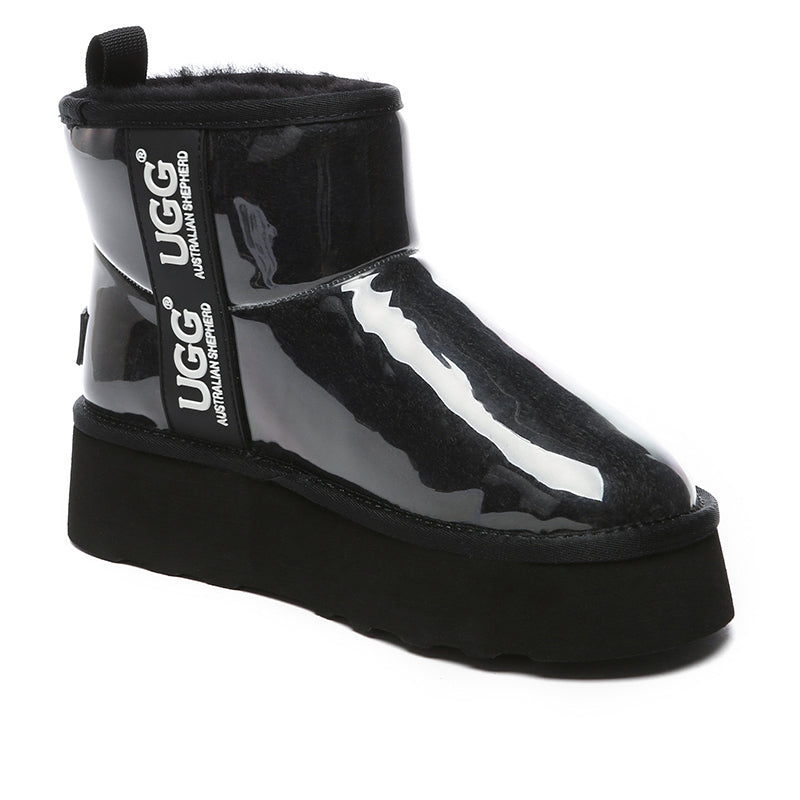 Black transparent platform UGG boots by EverUgg featuring clear soles and classic boot design.