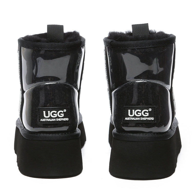 Black transparent platform UGG boots by EverUgg with chunky soles and clear uppers, stylish and trendy footwear.