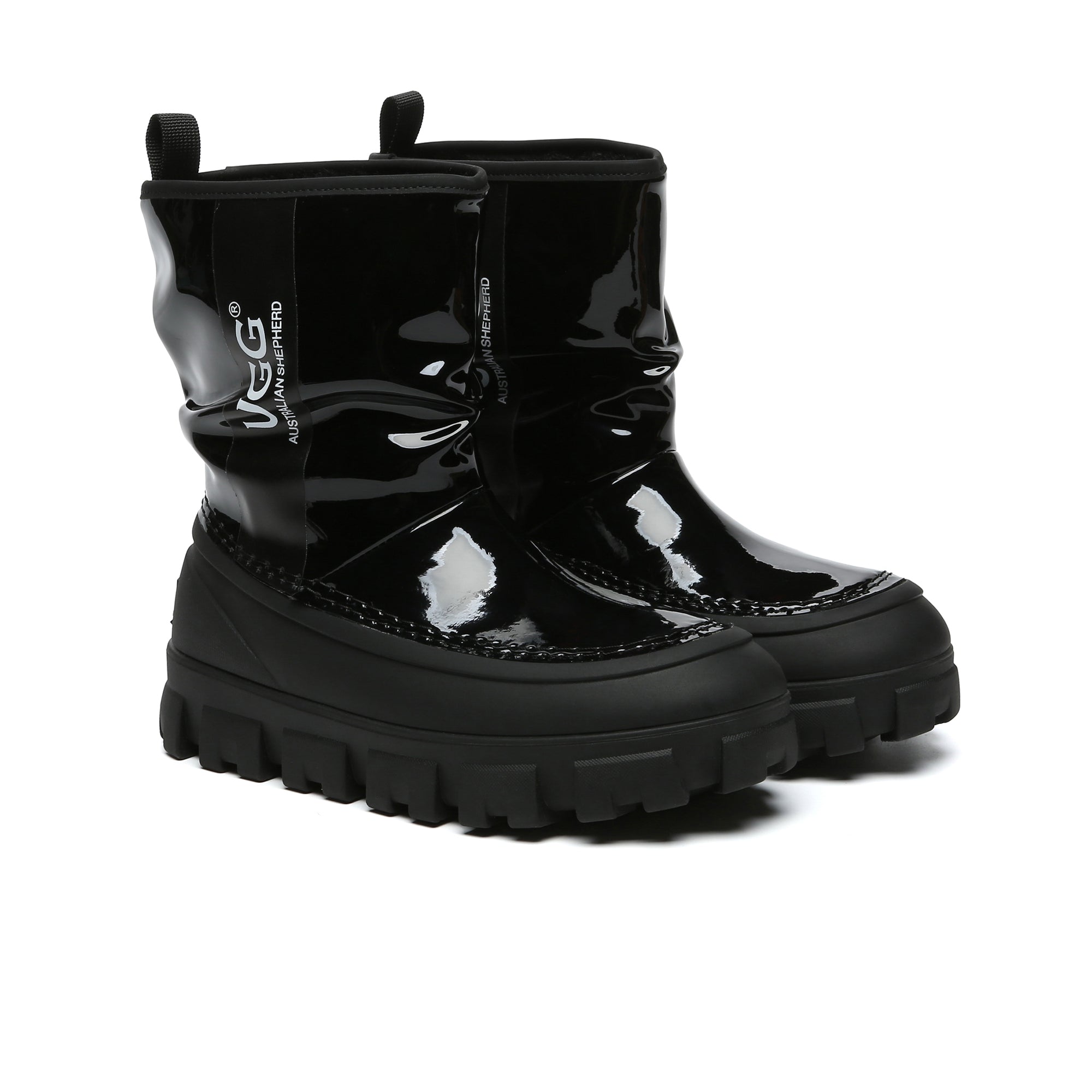 EverUgg chunky sheepskin rain boots with rugged soles and cozy sheepskin lining, perfect for rainy weather.