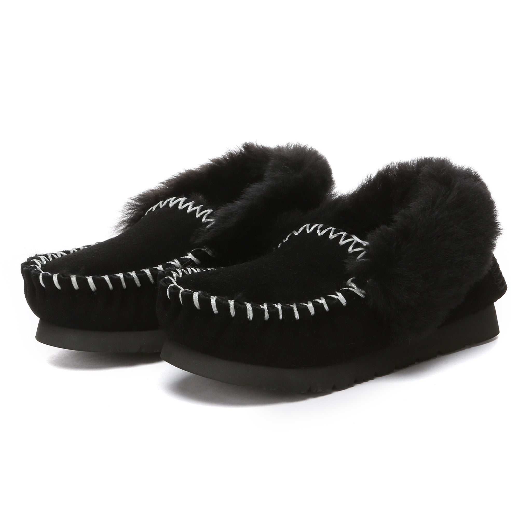EverUgg UGG Kids Traditional Moccasin slippers featuring soft suede material and cozy lining for comfortable indoor wear.