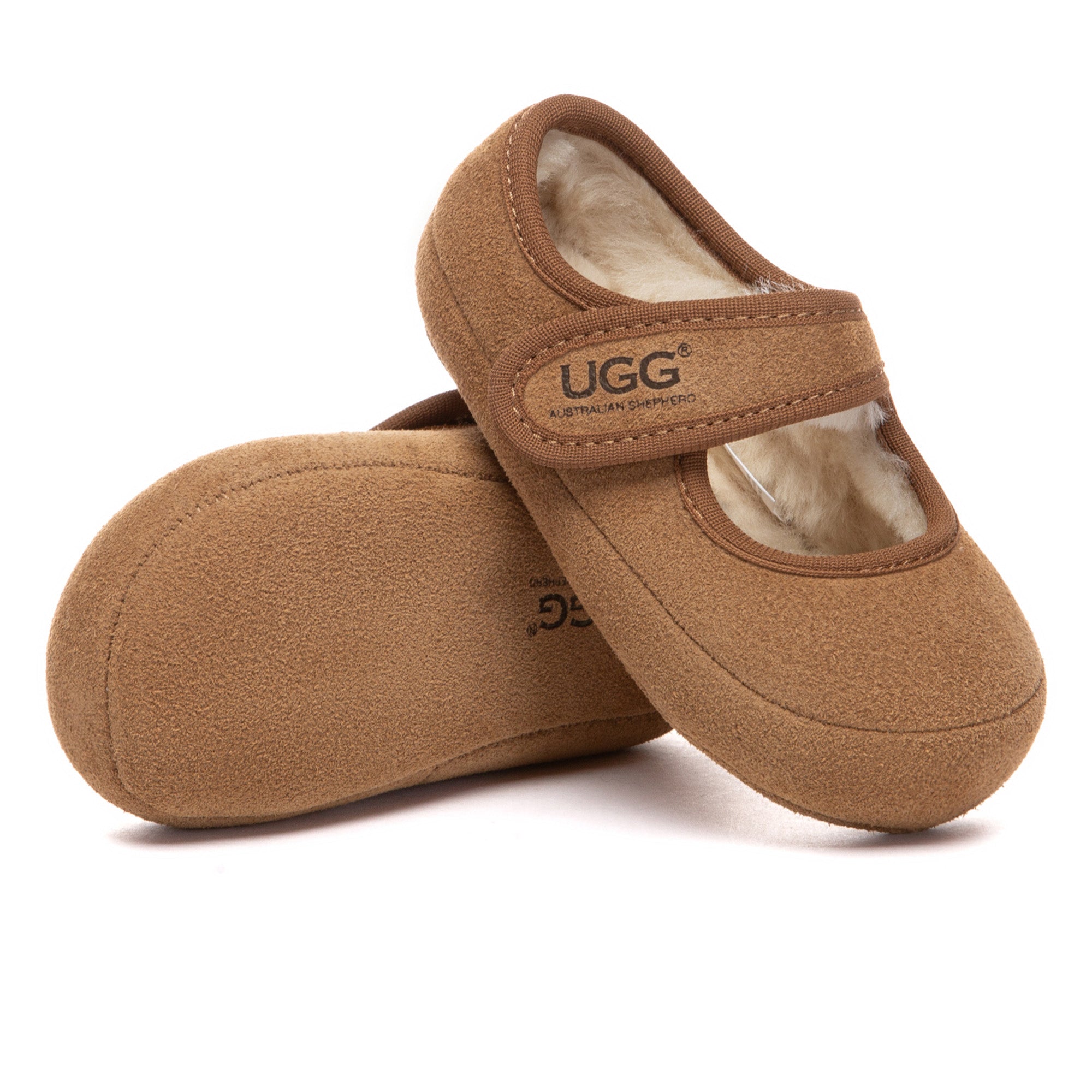 Bright pink UGG Millie Toddler Slippers by EverUgg, featuring soft plush material and classic Mary Jane style for kids.