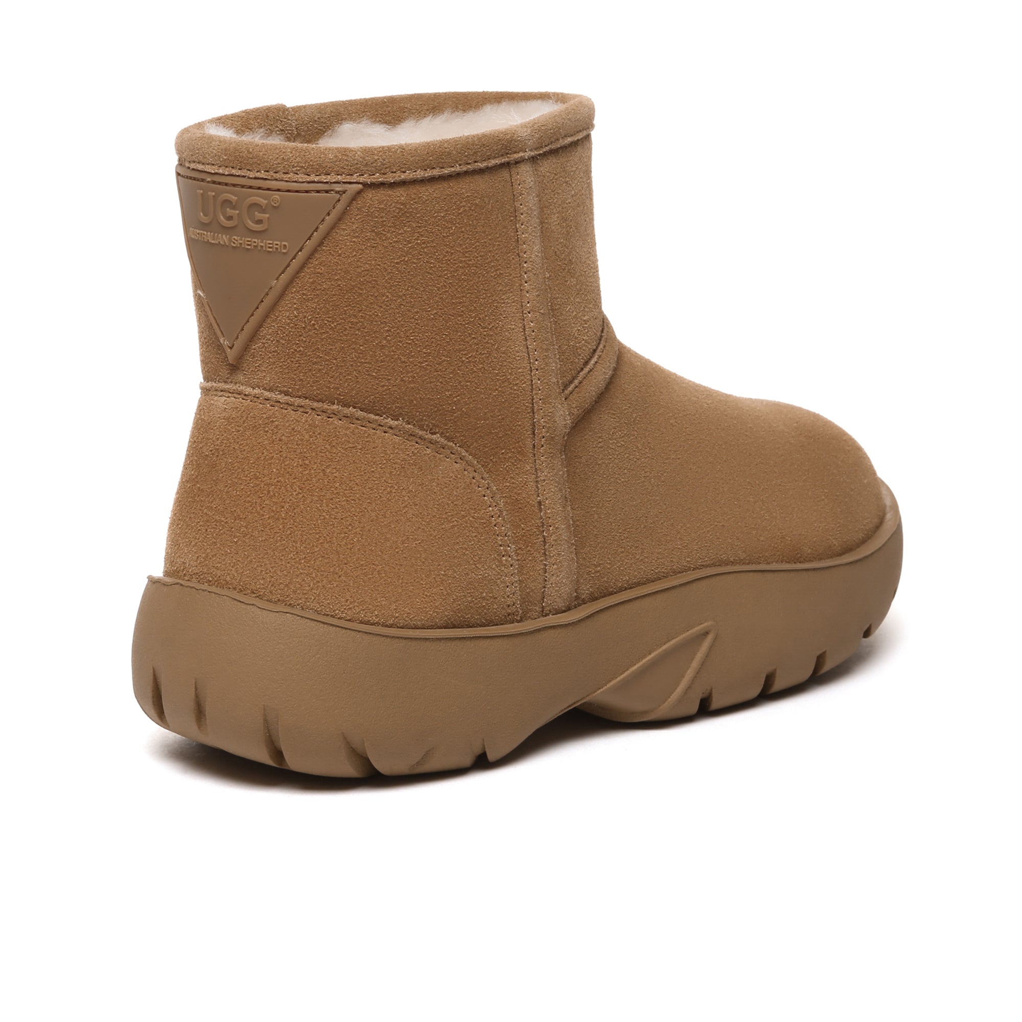 EverUgg UGG Mini Explorer Platform Boots featuring suede uppers and rugged soles, stylish and cozy winter footwear.