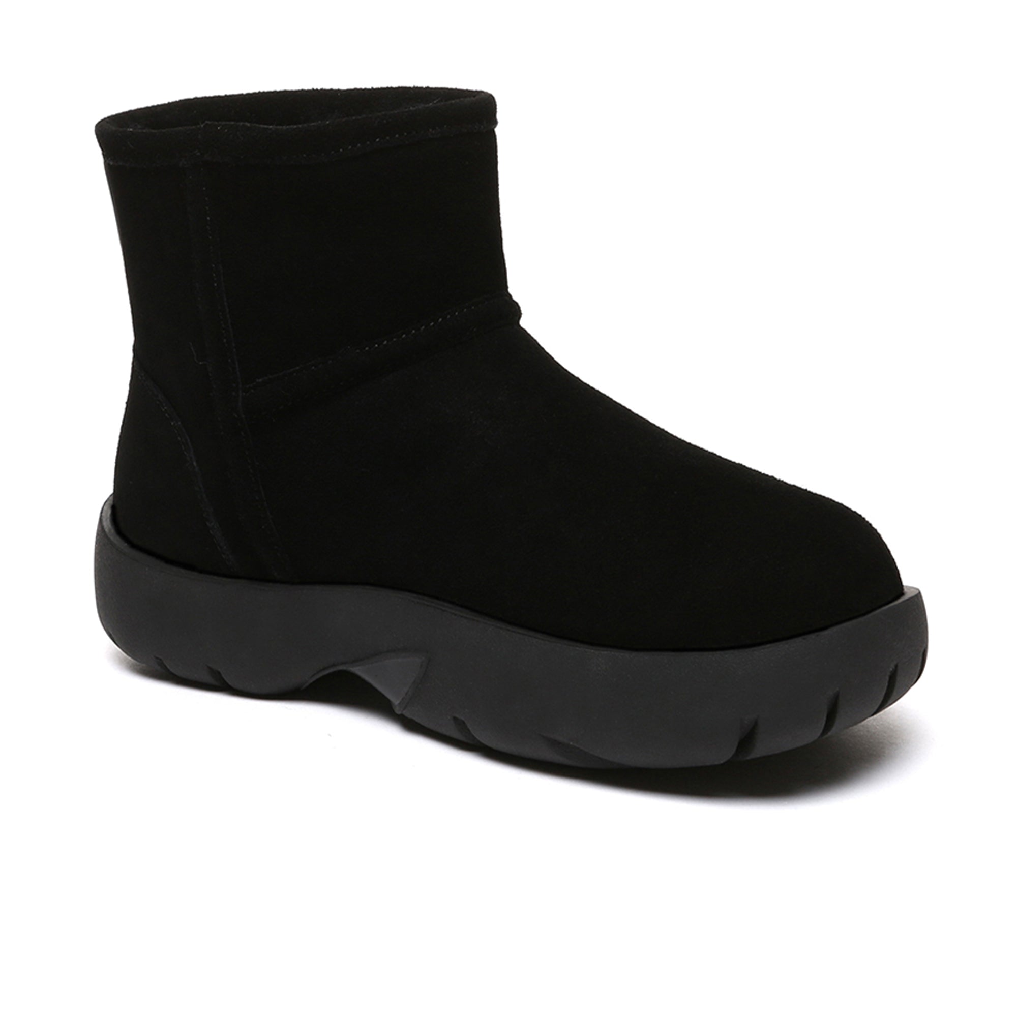 EverUgg UGG Mini Explorer Platform Boots showing tan leather uppers, rugged soles, and ankle height design.