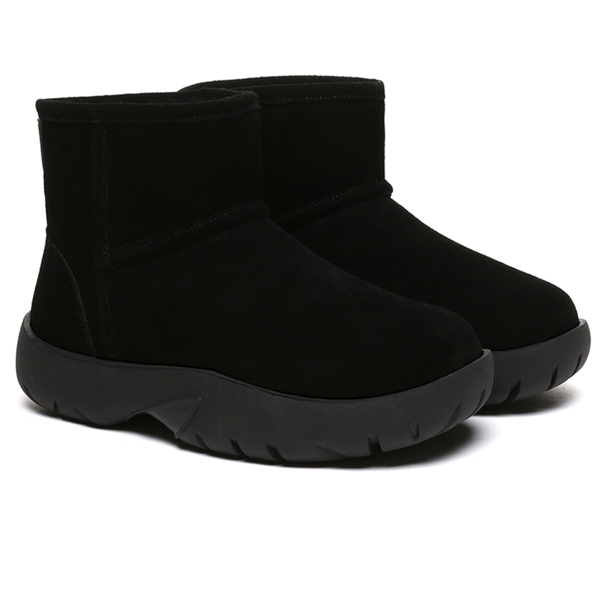 EverUgg UGG Mini Explorer Platform Boots in beige with rugged sole and ankle height, showcasing their stylish and cozy design.