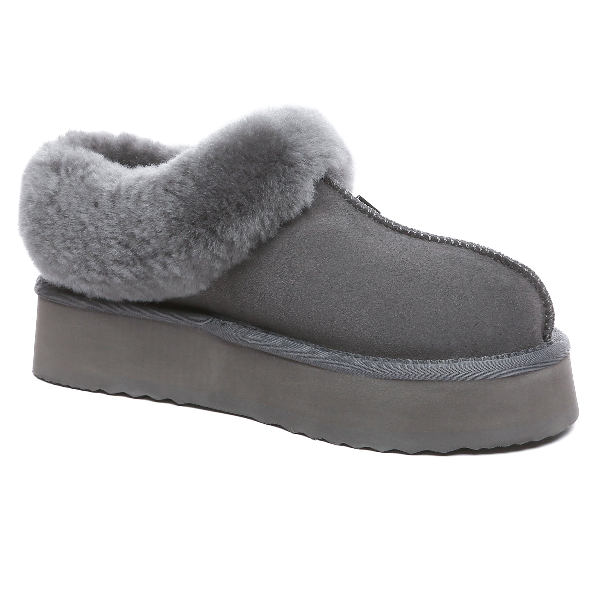 EverUgg UGG platform ankle slippers in plush material, featuring a stylish slip-on shoe design with a chunky sole.