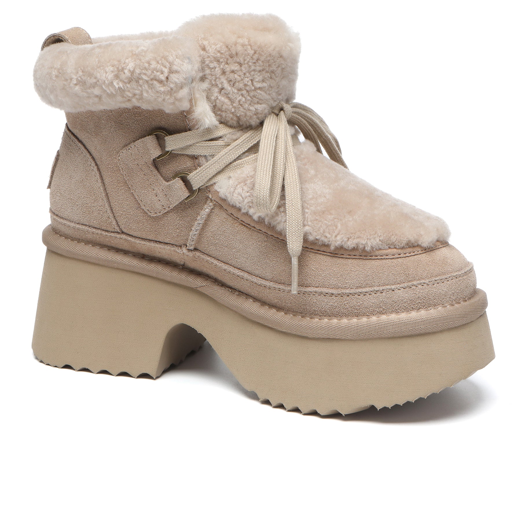 EverUgg UGG platform lace-up boots with shearling upper, showing the tan shoes with chunky soles and stylish laces.