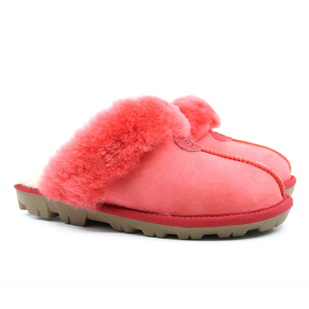 A pair of red UGG Scuff Slippers for women by Auzland, featuring soft plush material and slip-on design for cozy comfort.