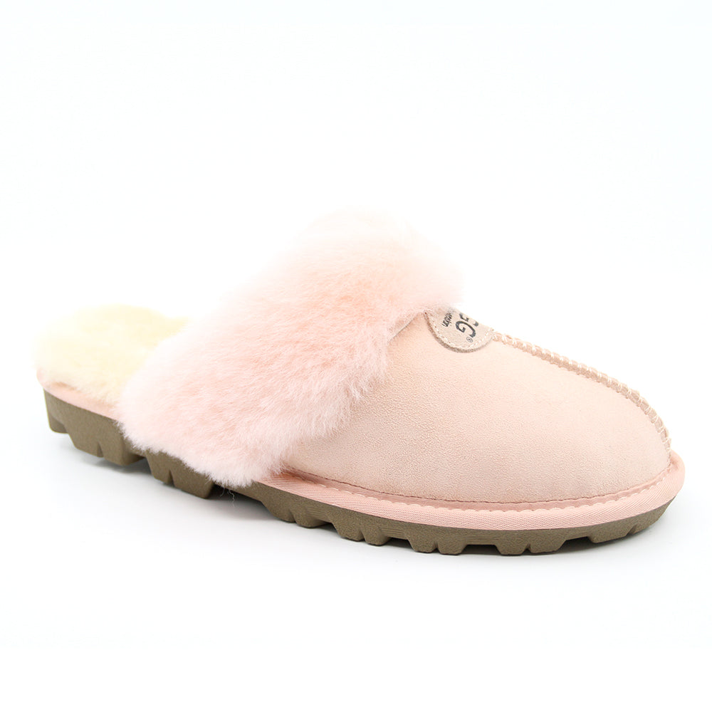 A pair of pink UGG Scuff Slippers for women, cozy slip-on shoes with soft lining and plush exterior, perfect for indoor comfort.