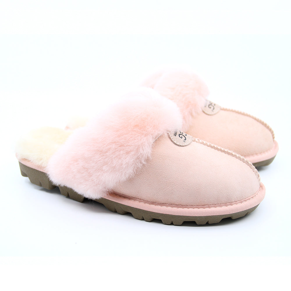 Pink UGG Scuff slippers for women by Auzland, showing cozy slip-on footwear with soft lining and open-toe design.