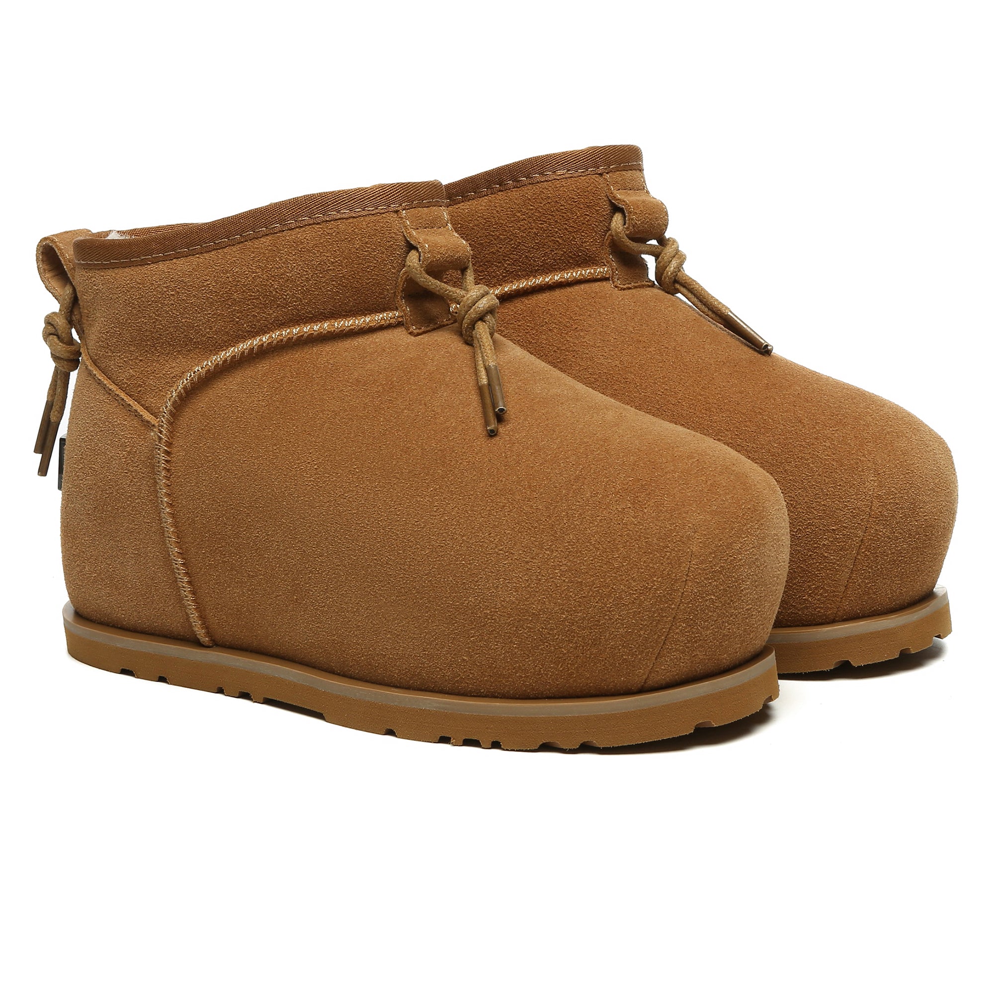 EverUgg UGG Ultra Mini Bred Boots for women, stylish fashion shoes with a cozy look, shown in a close-up view of the boots.