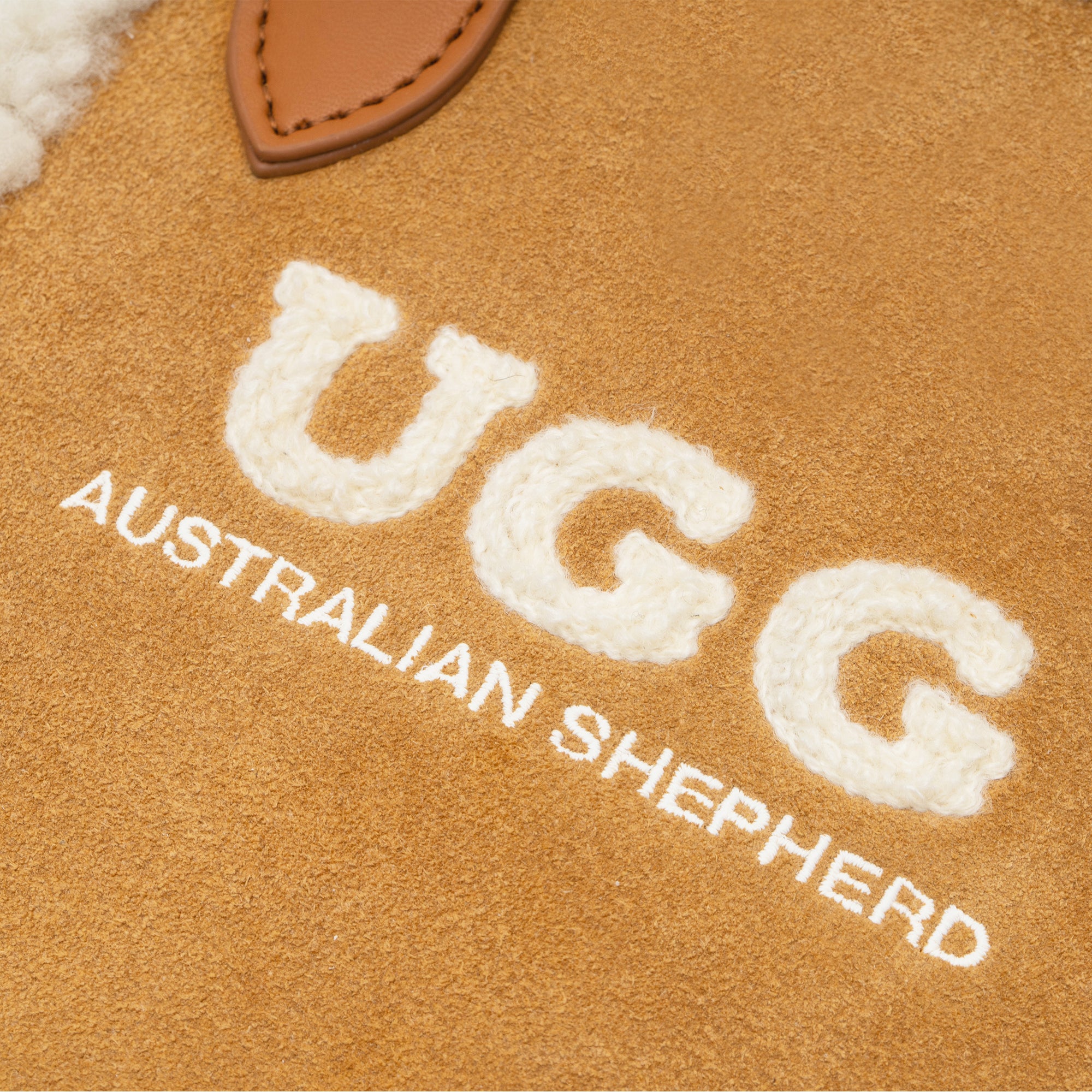EverUgg wool bag with adjustable strap, soft textured accessories bag in neutral tones, perfect for casual use.