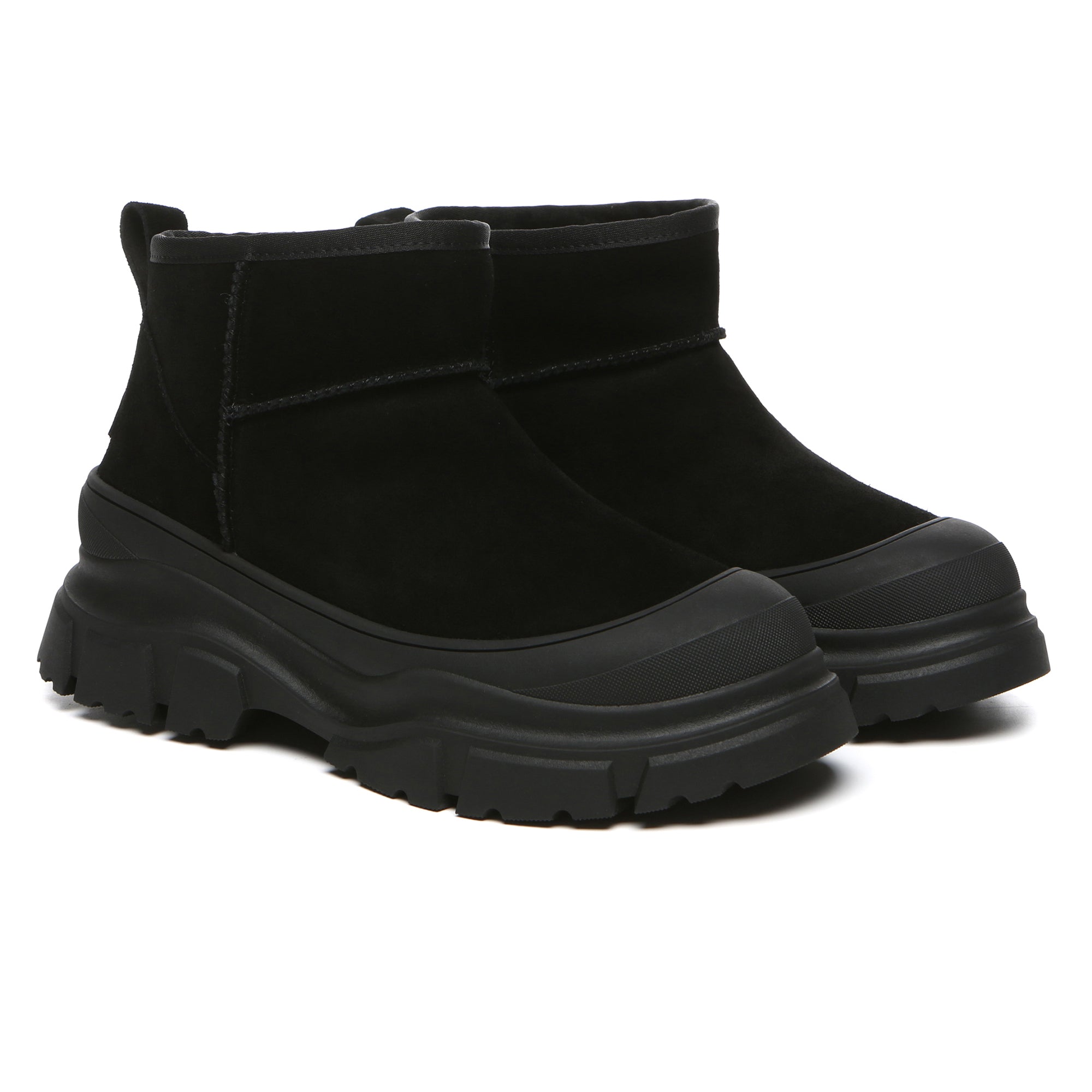 EverUgg Ultra Mini Classic Chunky UGG Platform shoes for women with tan leather uppers and thick rubber soles.