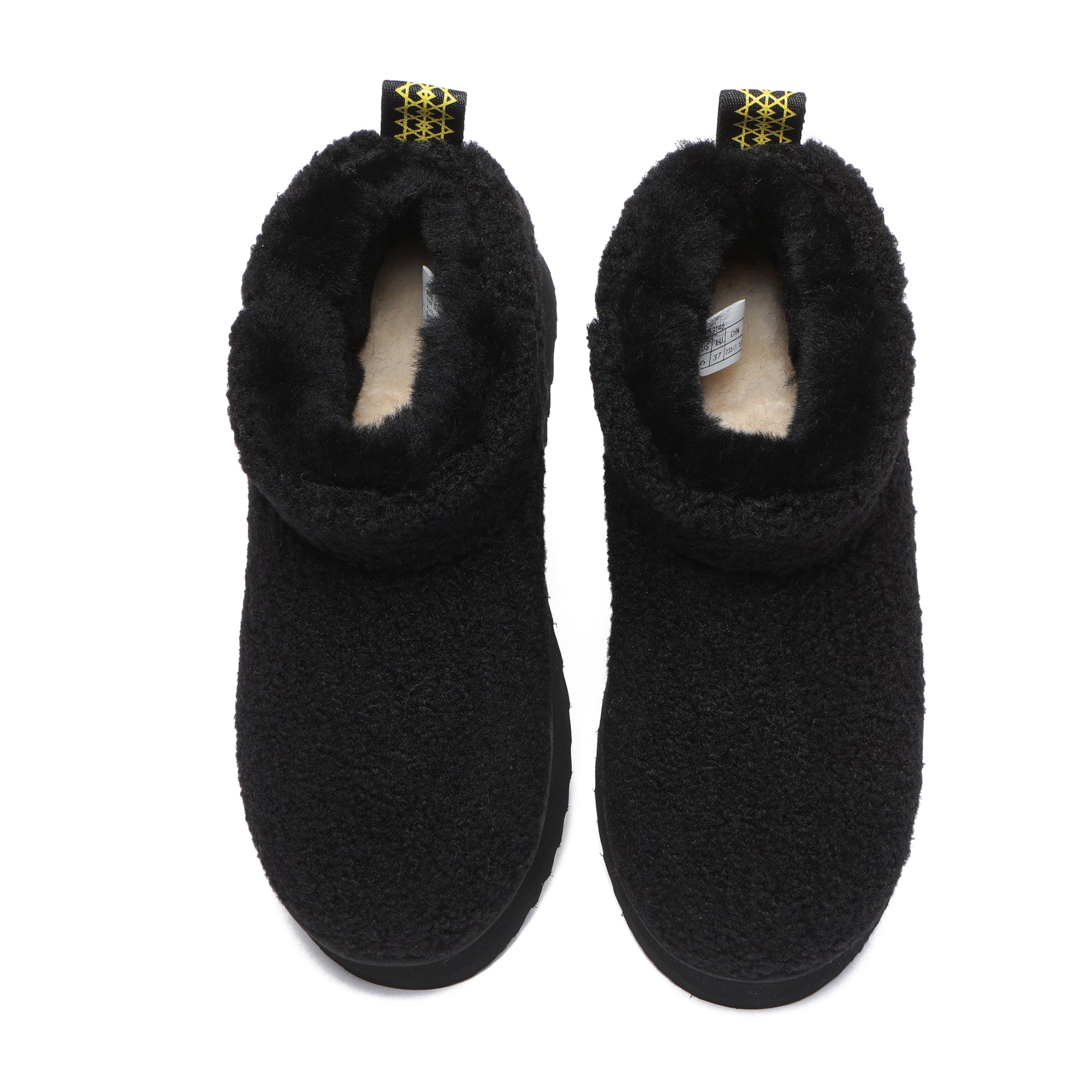 Black Ultra Mini TeddyFluff Platform UGG Boots by EverUgg featuring plush teddy fluff and a chunky platform sole.