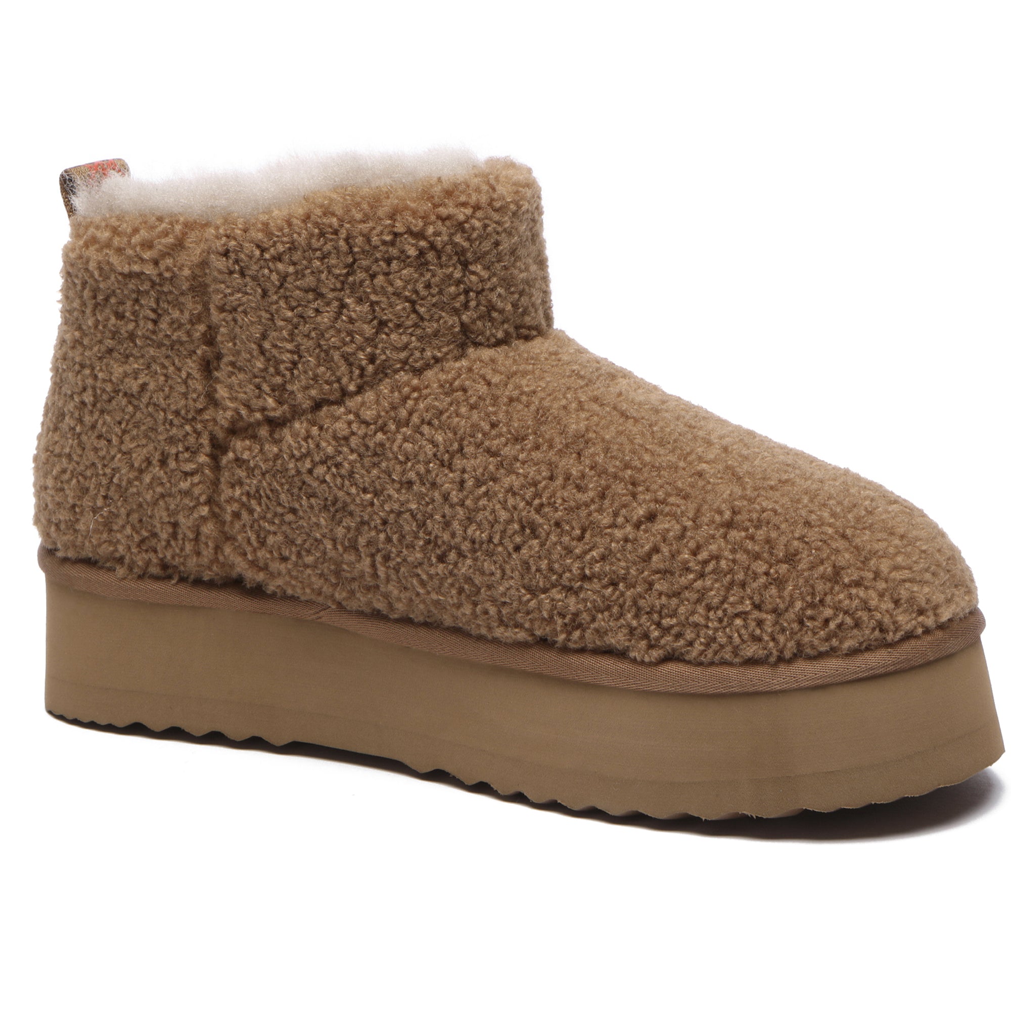 EverUgg Ultra Mini TeddyFluff Platform UGG Boots featuring plush teddy fur and a stylish platform sole on a cozy footwear display.