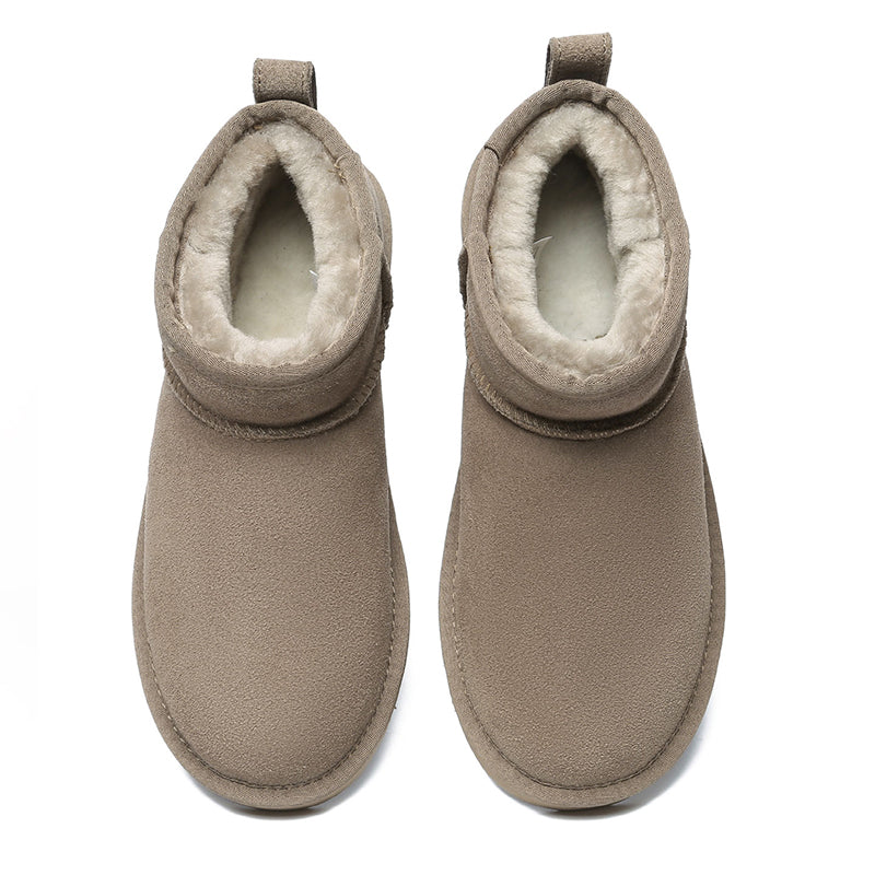 Dark brown EverUgg Ultra Mini UGG boots for women, classic sheepskin shoes, showing the cozy, plush interior and stylish exterior.
