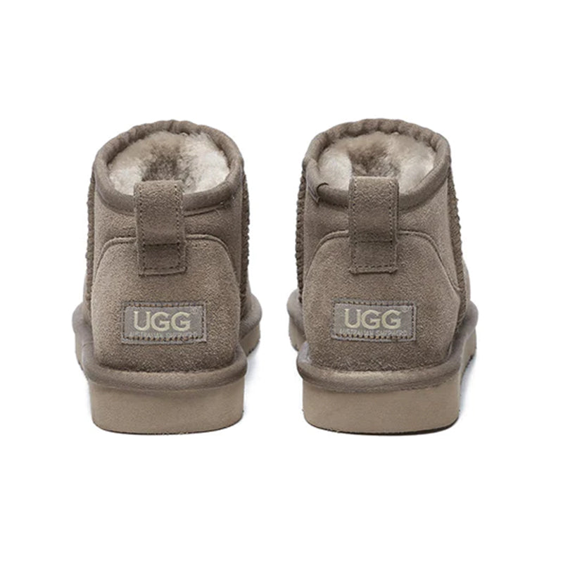 Dark brown Ultra Mini UGG boots for women from EverUgg, showcasing soft sheepskin exterior and cozy sole design.