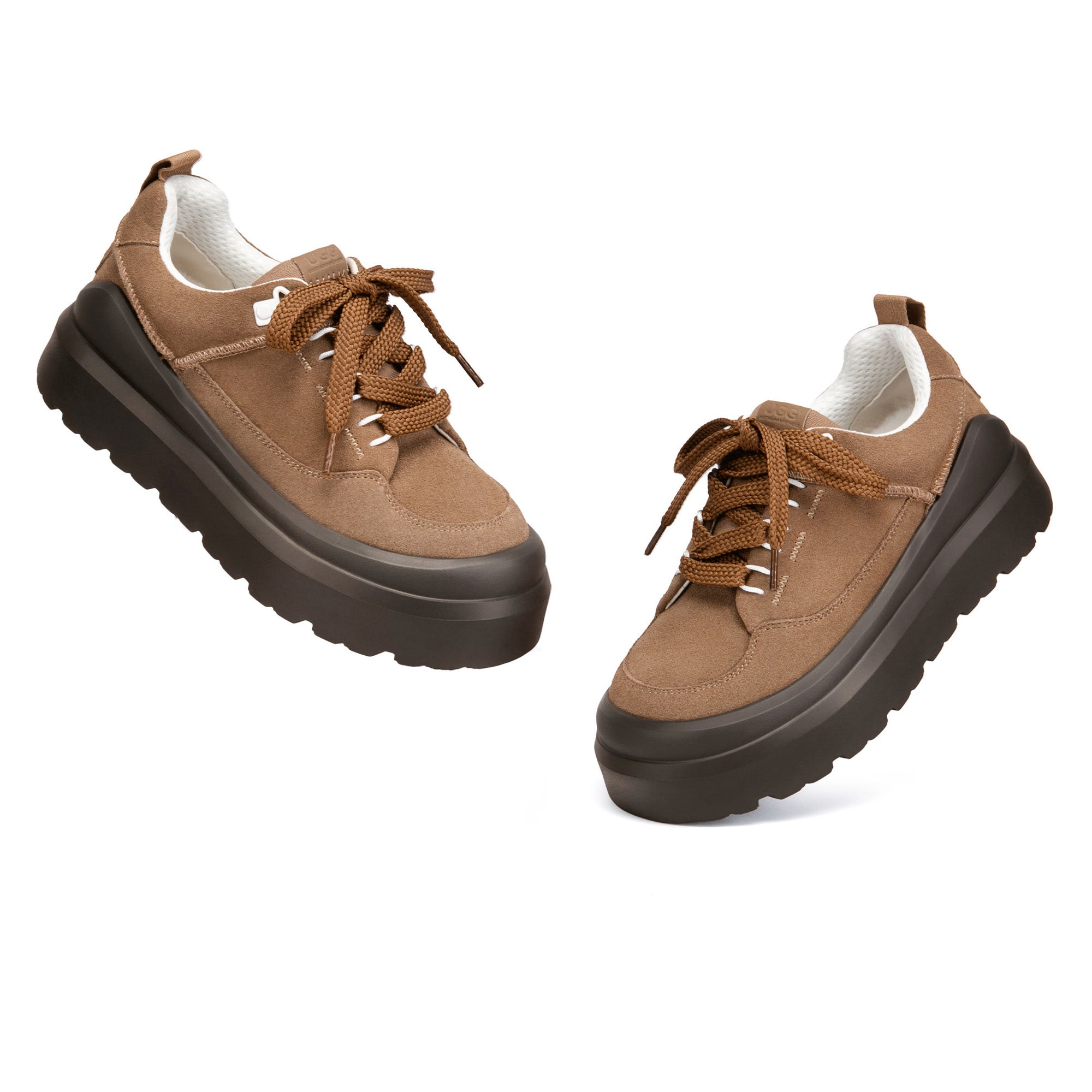 EverUgg versatile sneakers with sleek design, white laces, and cushioned soles, perfect for casual wear and everyday comfort.