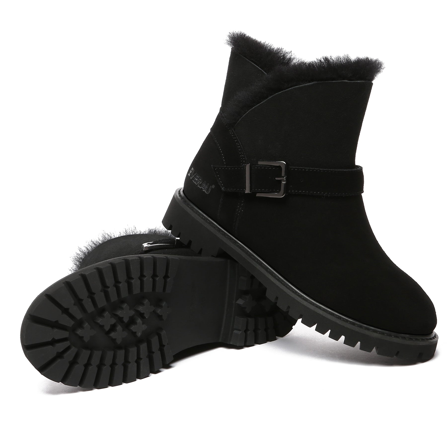 Black women’s buckle mini UGG boots by EverUgg featuring a stylish buckle detail and cozy sheepskin interior.