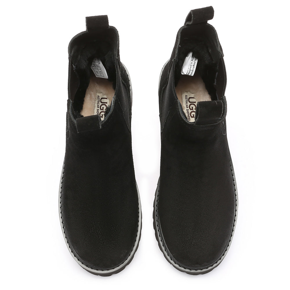 Black EverUgg women’s Chelsea boots with elastic side panels and low heel, stylish and versatile for everyday wear.
