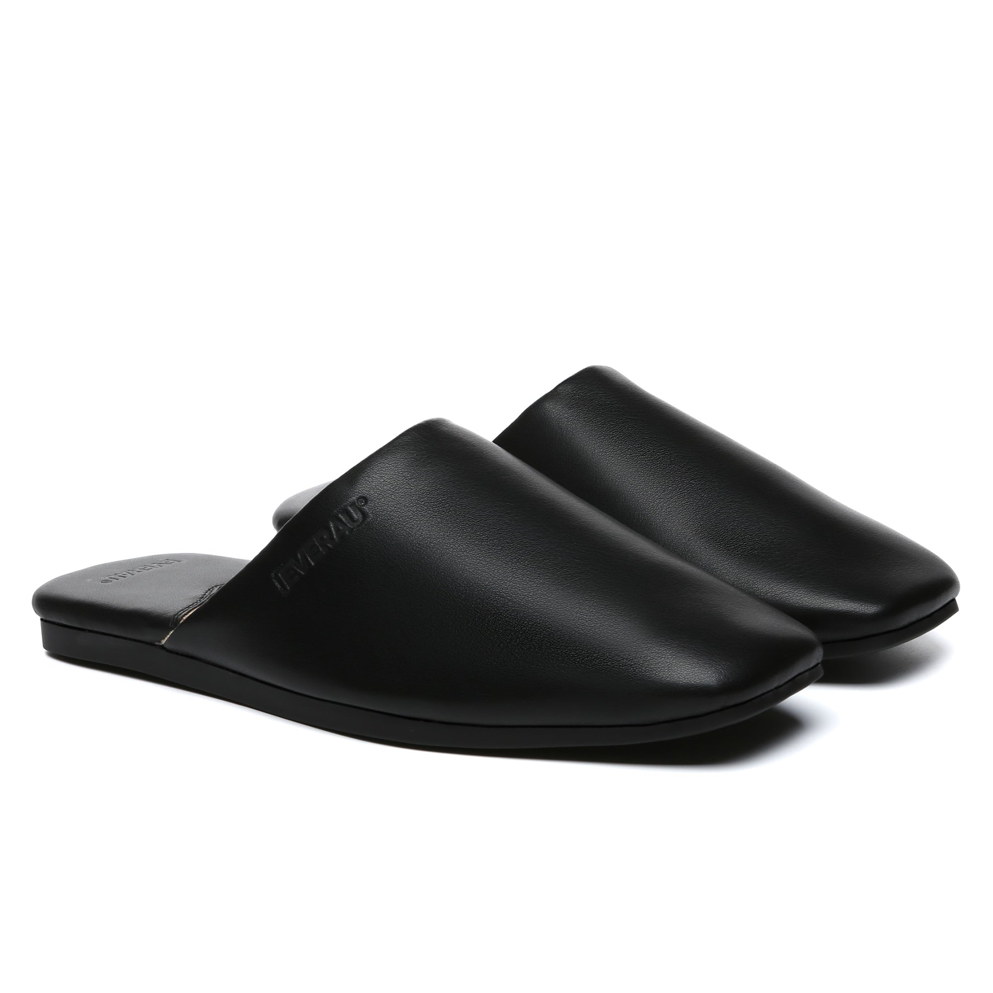 Women leather mules flats by EverUgg, stylish slip-on shoes with a smooth leather finish and comfortable flat sole.