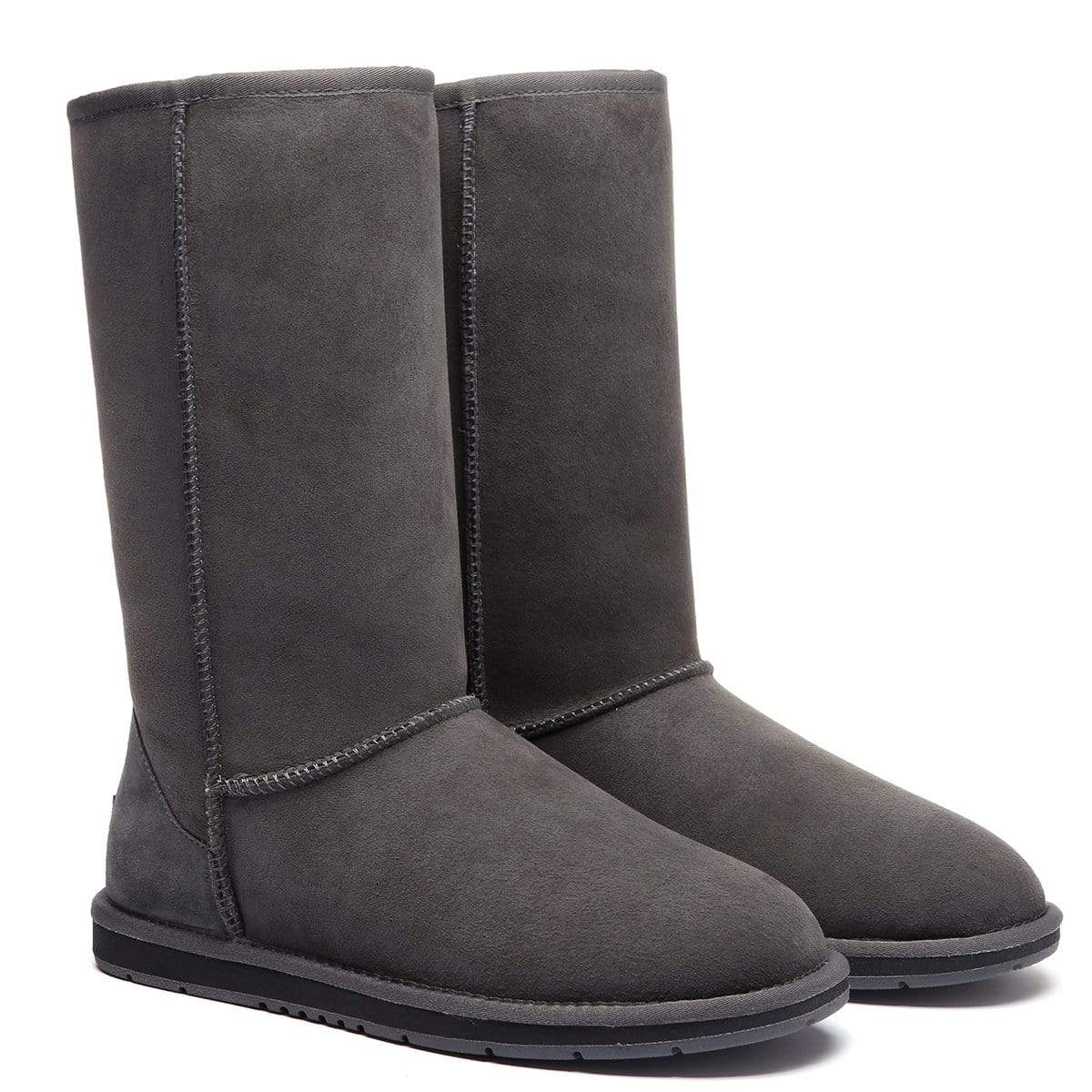 EverUgg tall classic UGG boots for women, featuring plush sheepskin lining and sleek leather exterior, styled for winter wear.