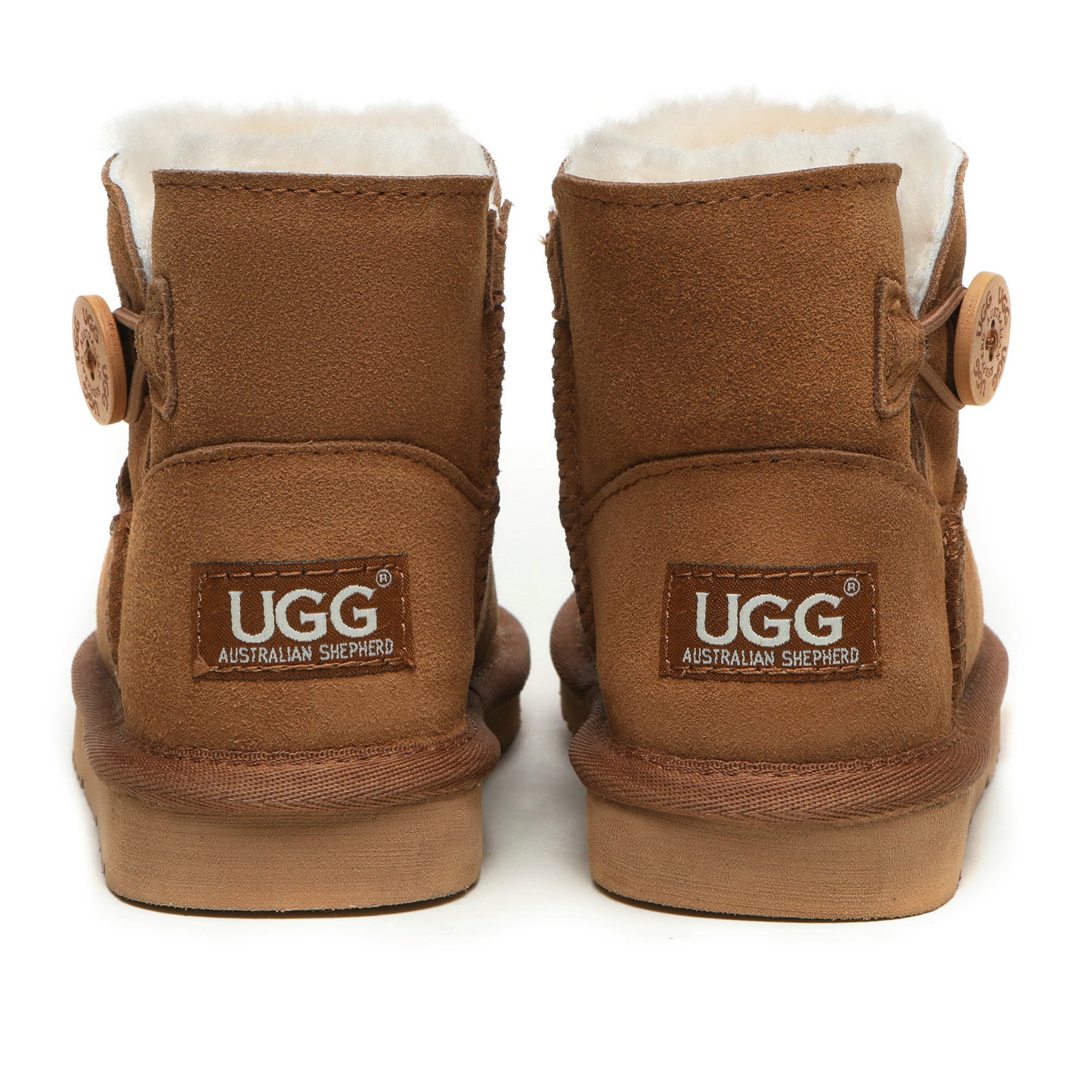 Mini Button Kids UGG Boots by EverUgg featuring small decorative buttons and cozy suede material for young children.