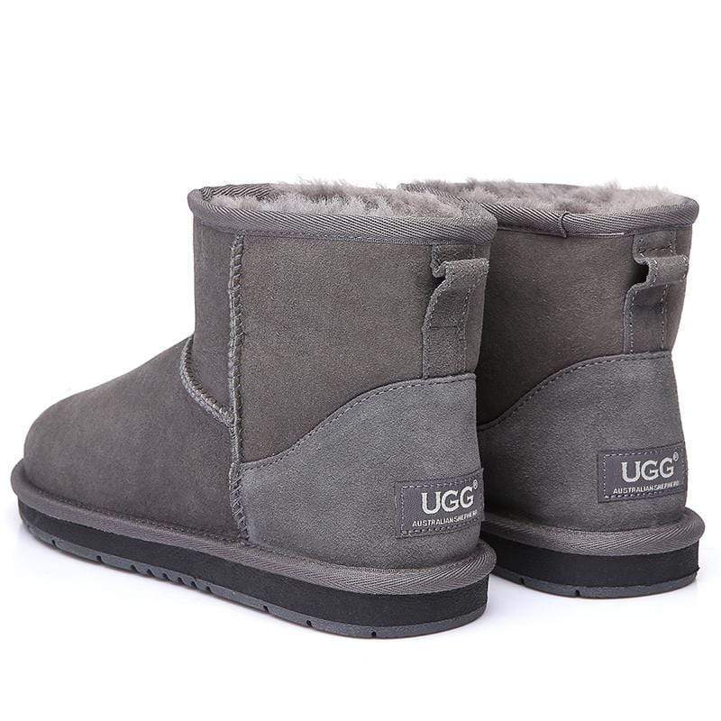 Close-up of beige Mini Classic UGG Boots for women by EverUgg, featuring soft sheepskin and cozy design.