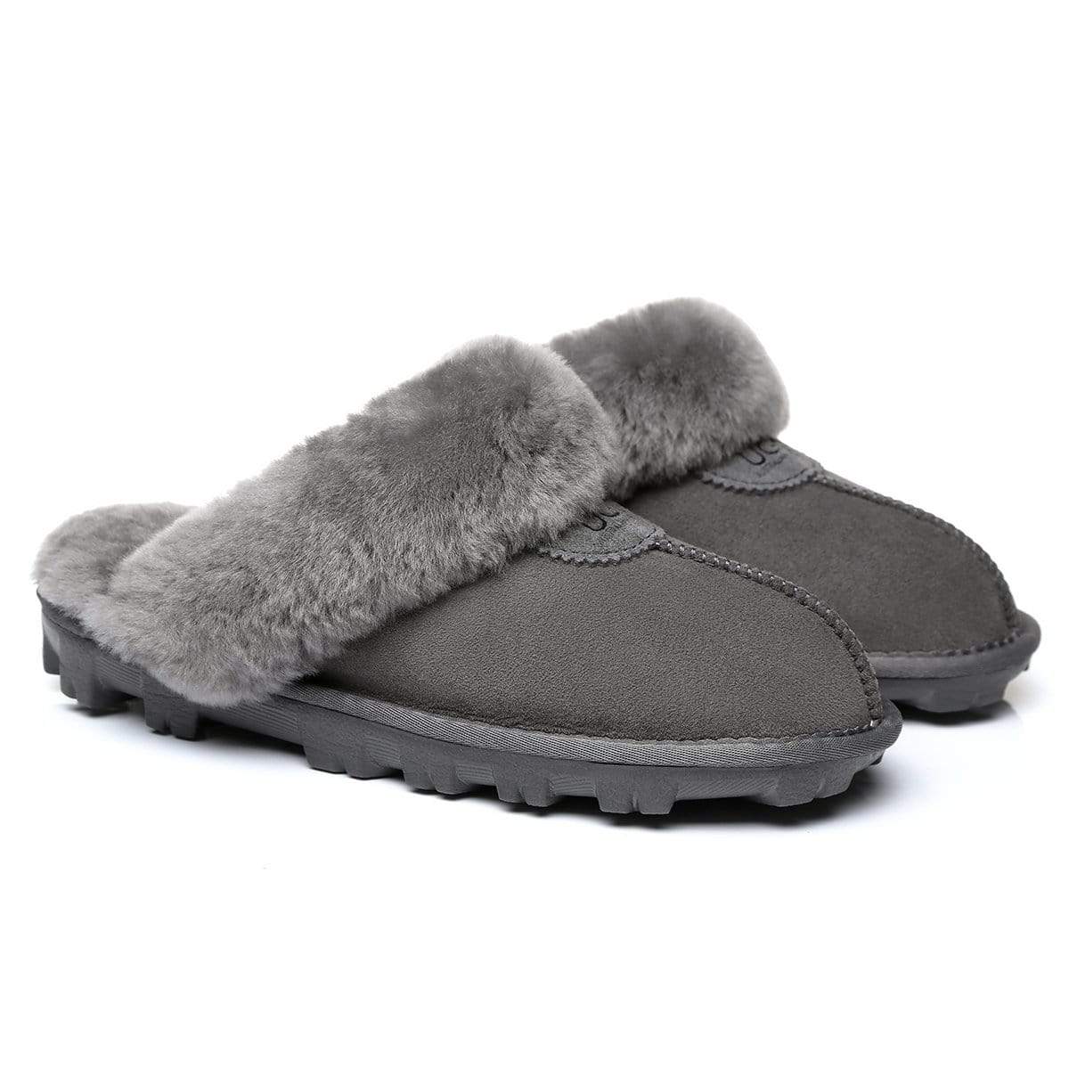 Unisex UGG slippers by EverUgg featuring plush lining, slip-resistant soles, and cozy design for women’s comfortable indoor footwear.