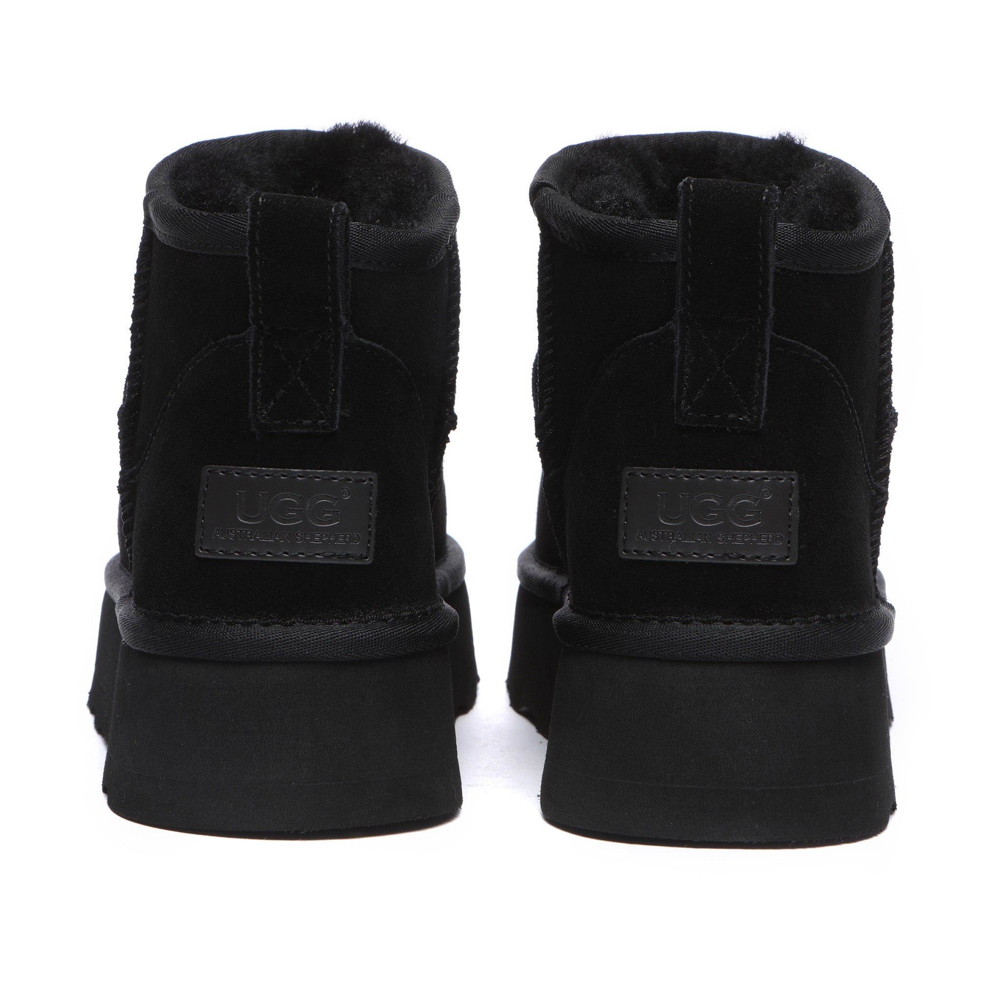 Black EverUgg Premium Platform Mini UGG Boots with cozy shearling lining and thick rubber soles.