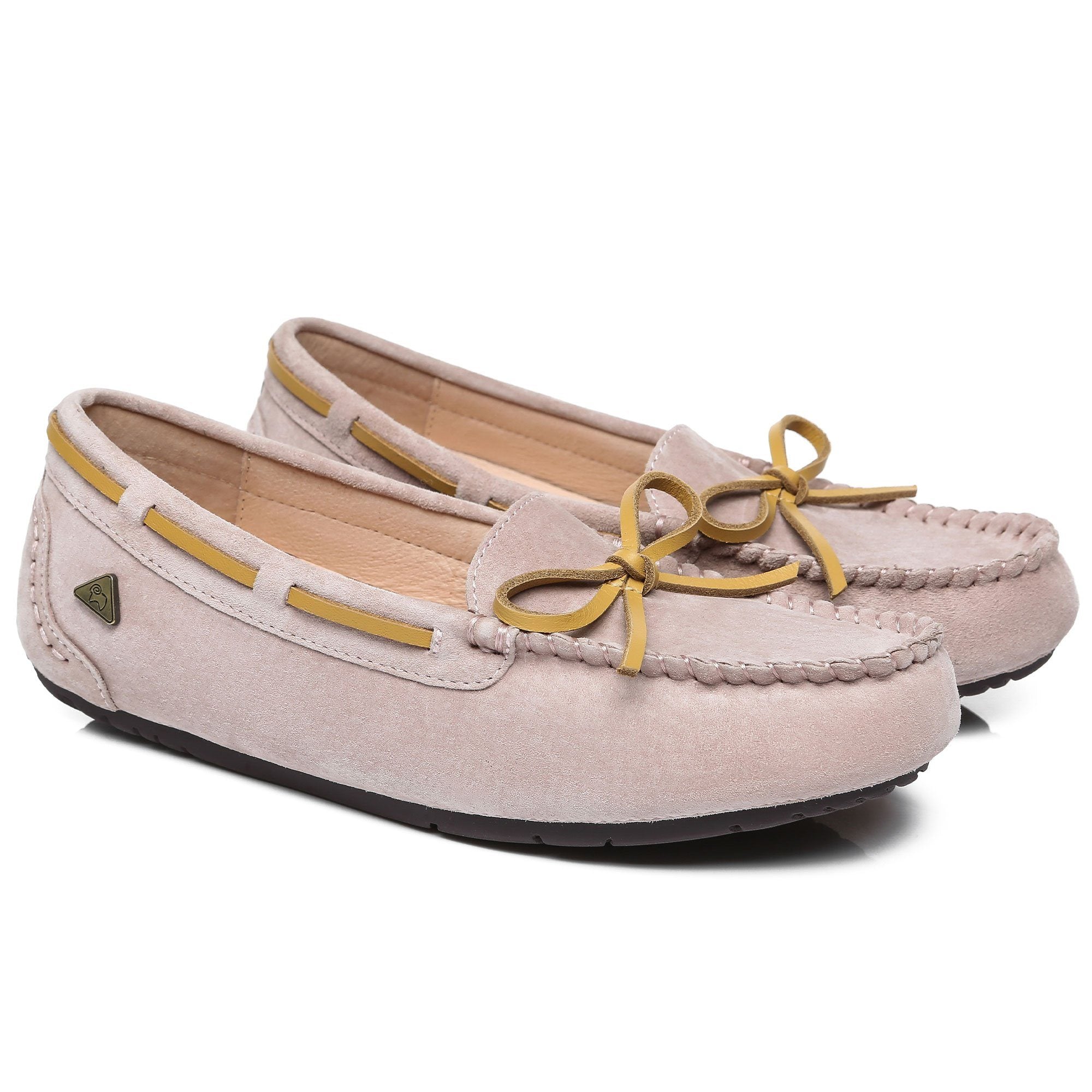 Women's premium summer UGG moccasin shoes in soft leather with stitching detail and a comfortable slip-on design.
