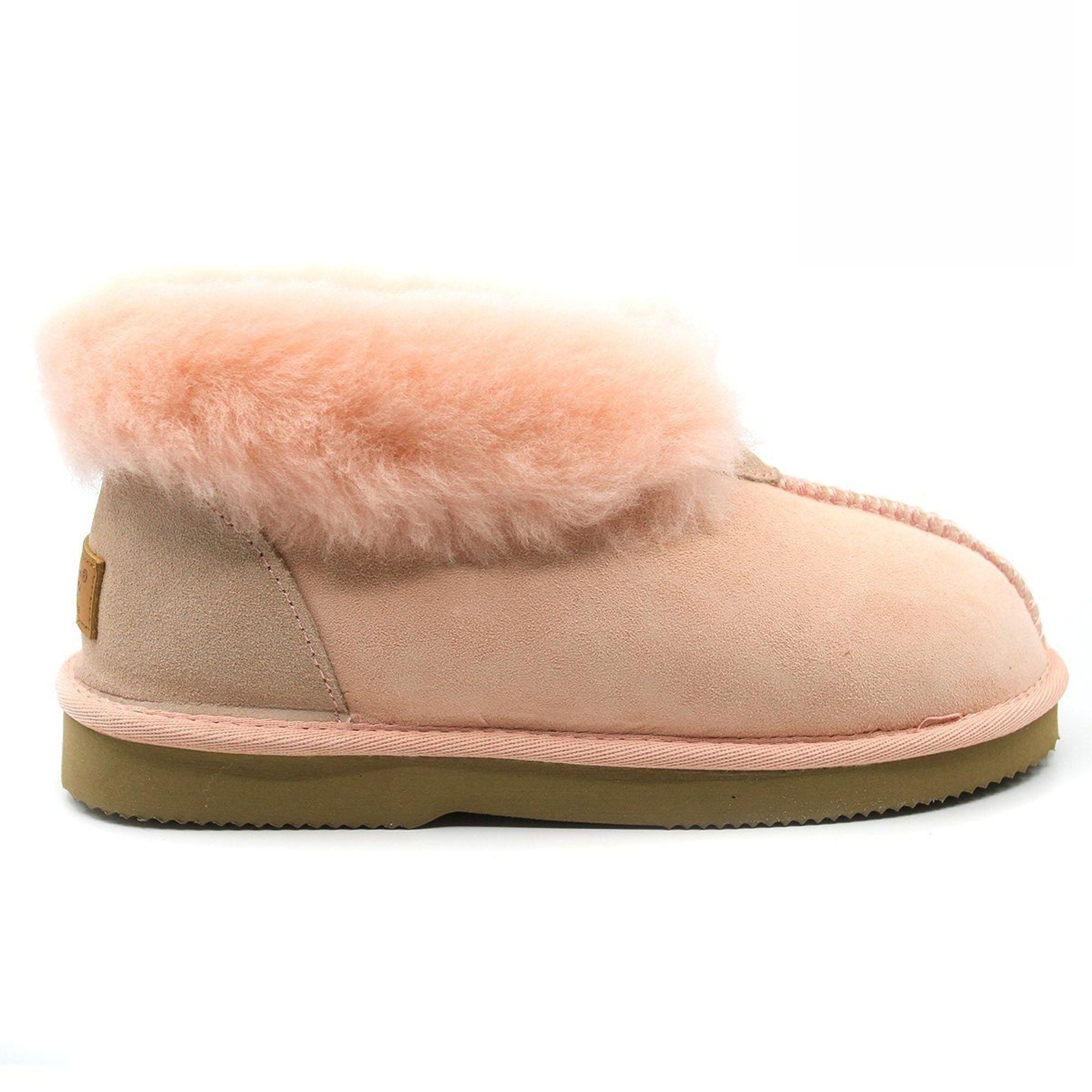 Light pink UGG ankle slippers by Auzland, Australian-made women's slip-on shoes with cozy interior and casual style.