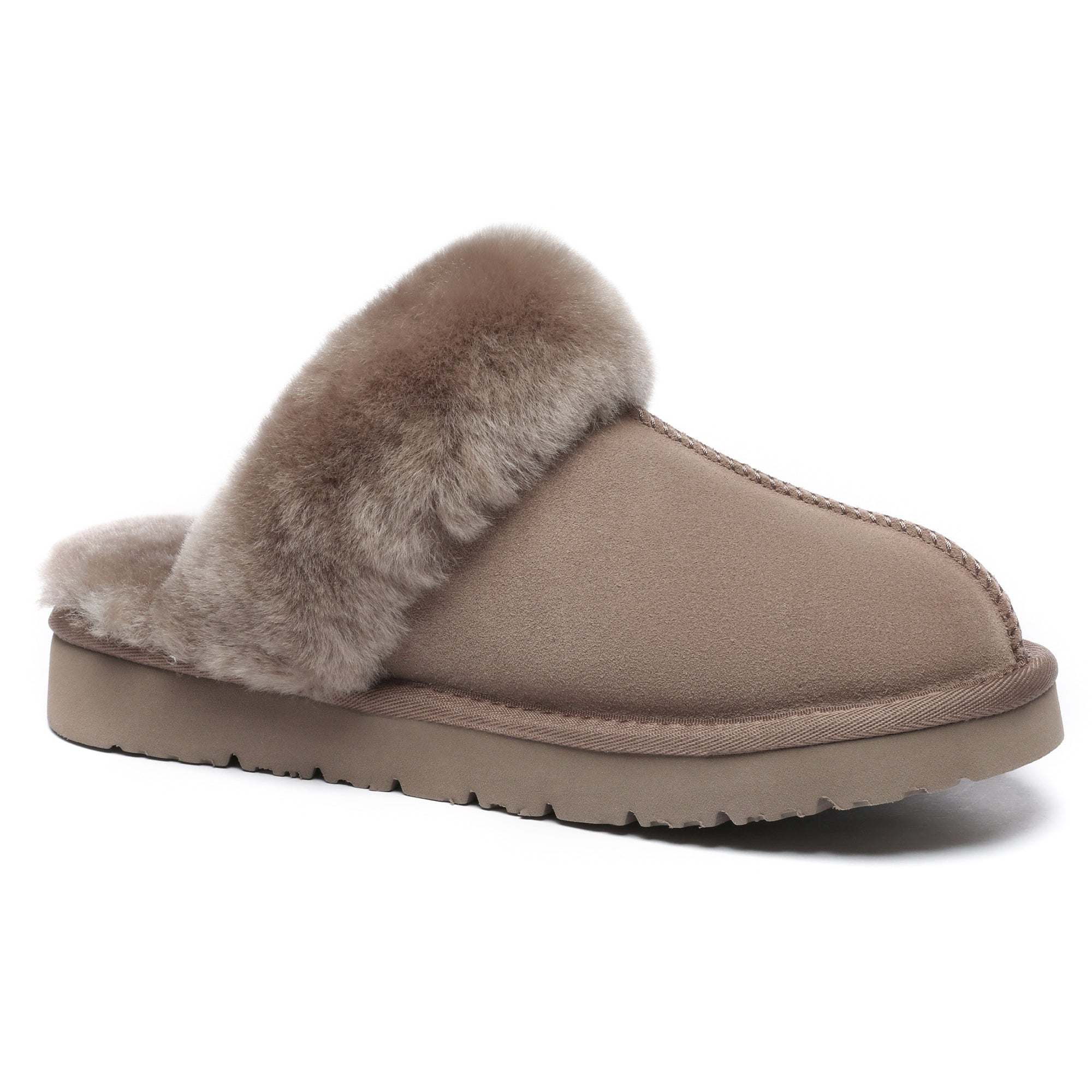 Comfortable women’s UGG slippers by EverUgg featuring plush interior and soft suede exterior for cozy indoor wear.