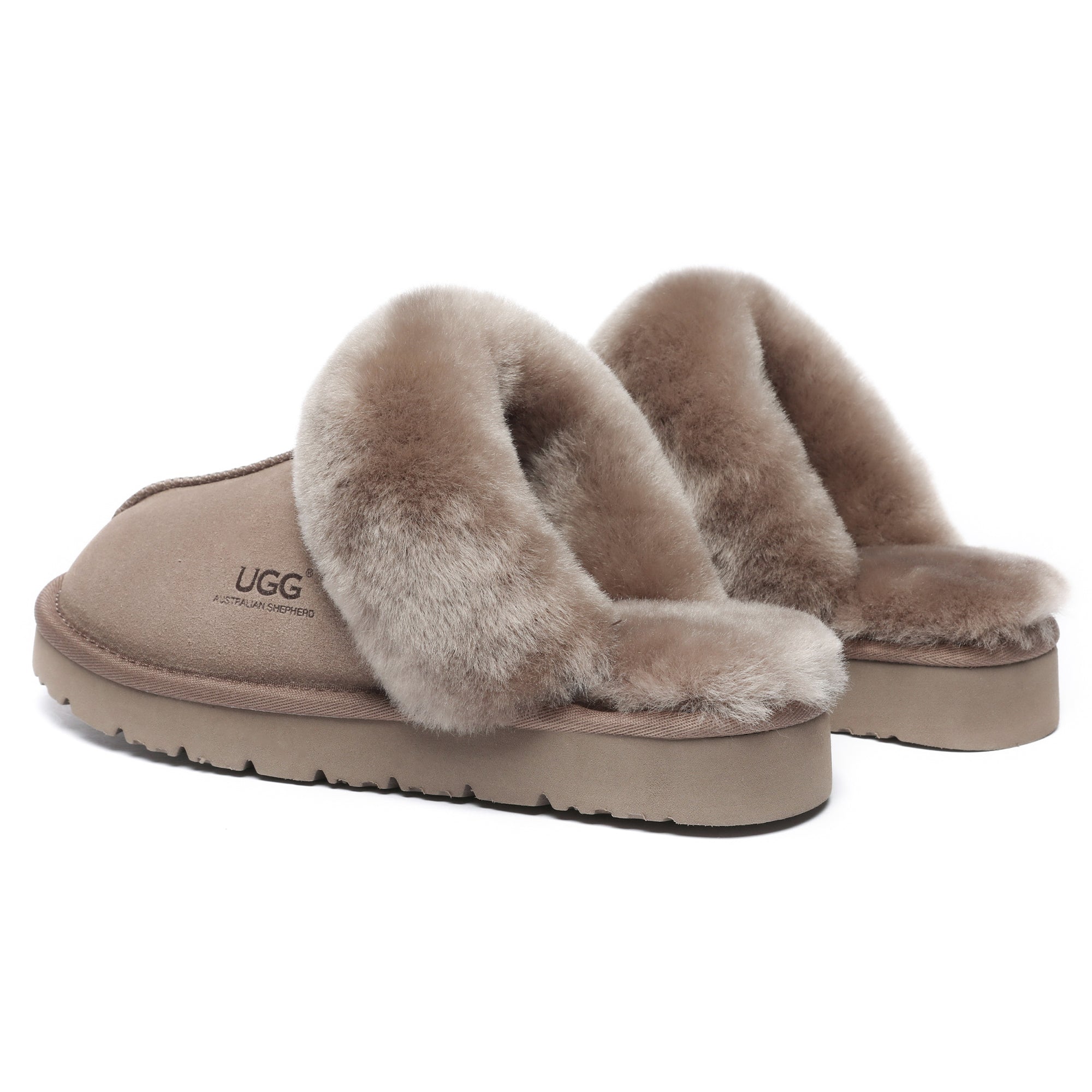 Comfortable women’s UGG slippers by EverUgg featuring plush lining and cozy design, perfect for relaxing at home.