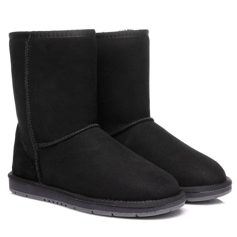 Pair of EverUgg Short Classic UGG Boots for women, featuring soft suede exterior and cozy shearling lining.