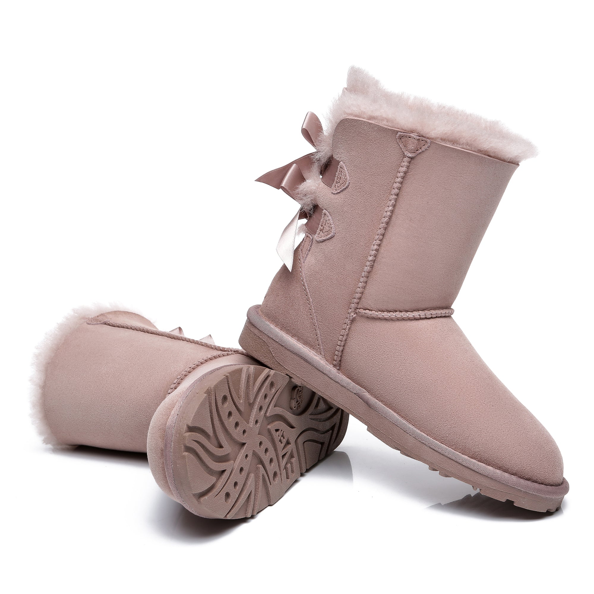 Pink EverUgg short double bow women's UGG boots with stylish design and cozy interior, perfect for winter fashion.