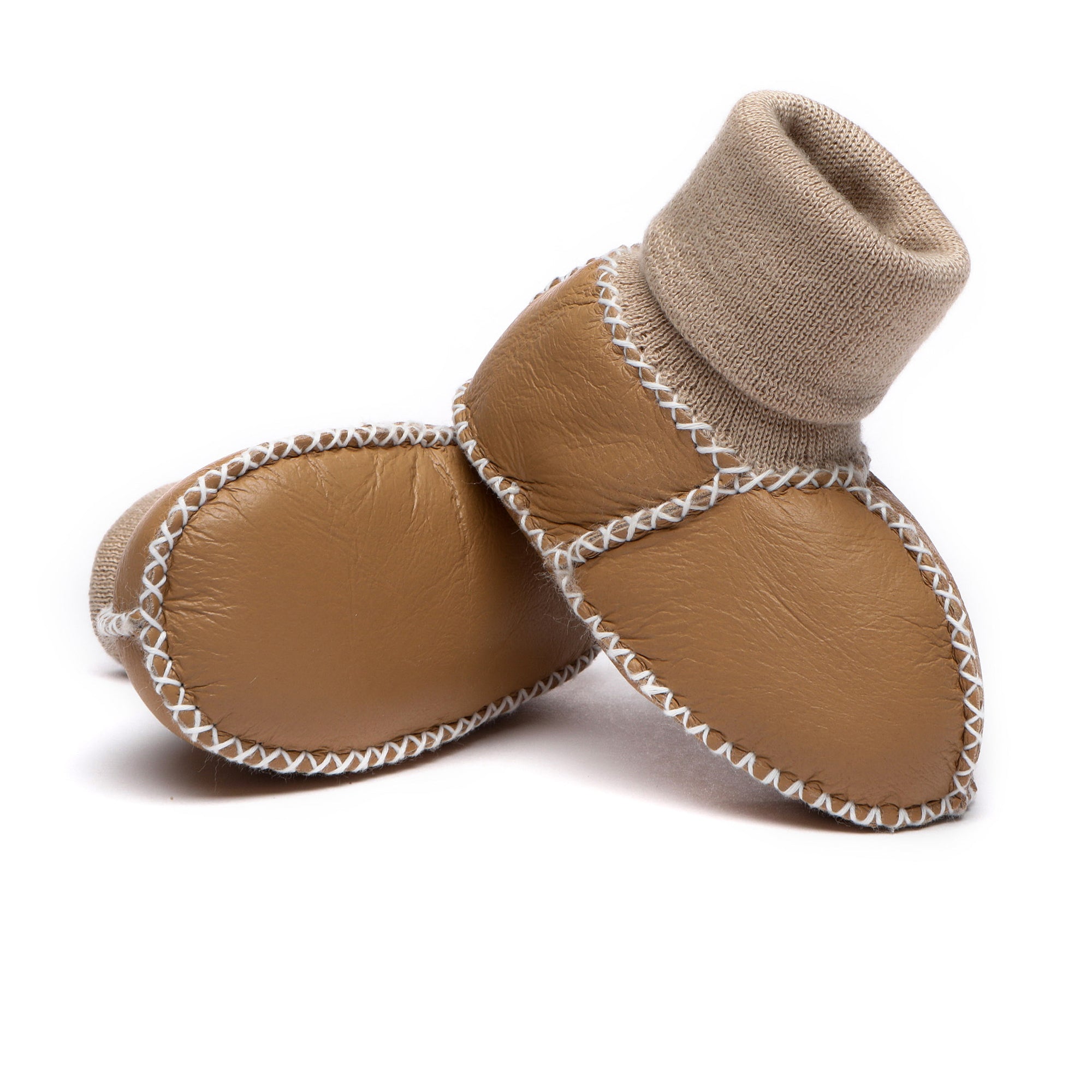 Cute EverUgg baby booties in soft, cozy material, designed for infants, featuring a warm, stylish UGG-inspired shoe for babies.