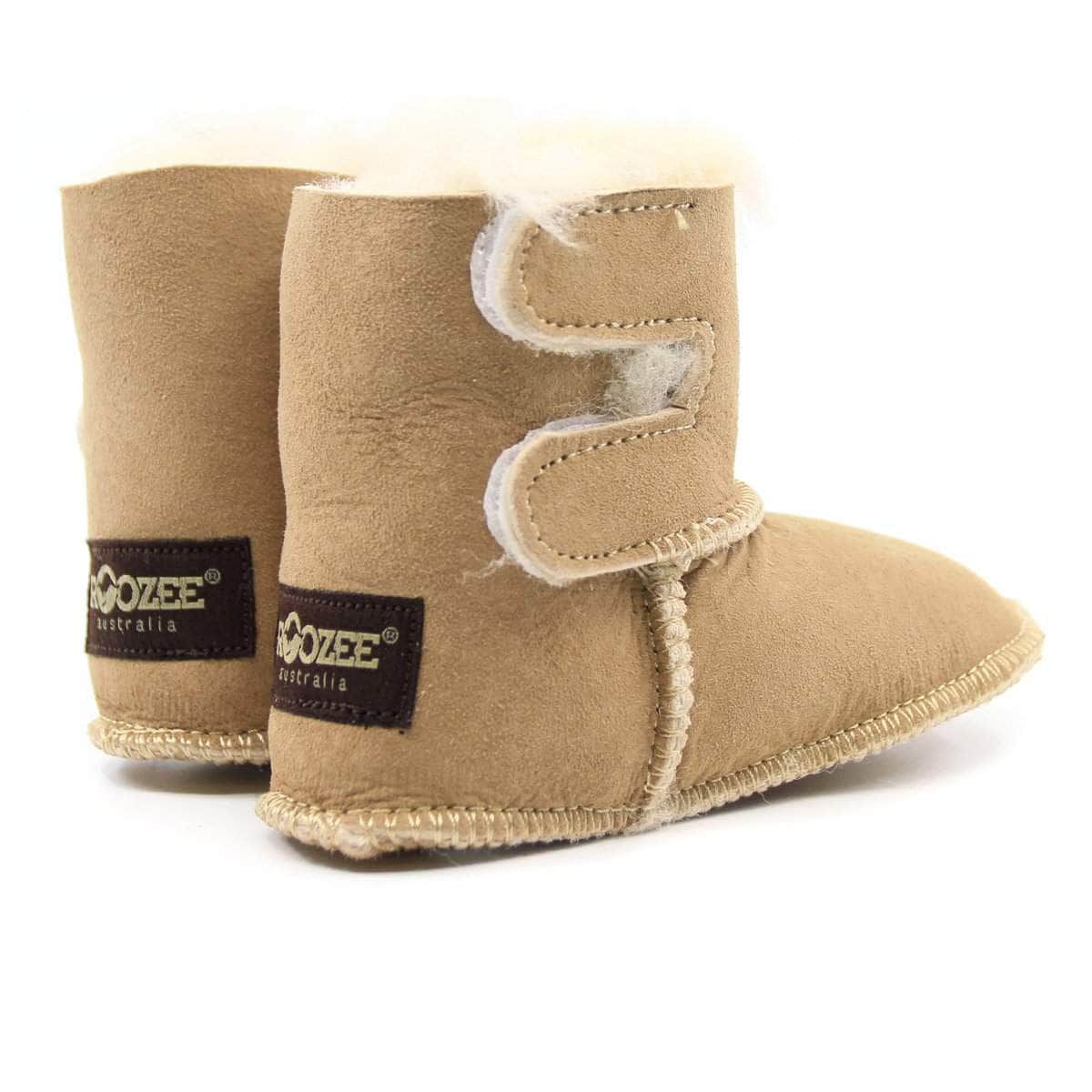 Comfortable UGG baby boots by UGG Direct NY with soft, cozy material and cute design for little feet.