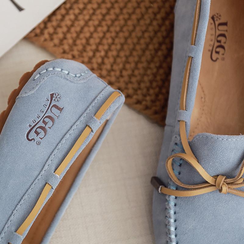 AuSnow UGG Ozsnow Moccasin slippers for women featuring plush lining and soft slip-on design, ideal for cozy indoor wear.