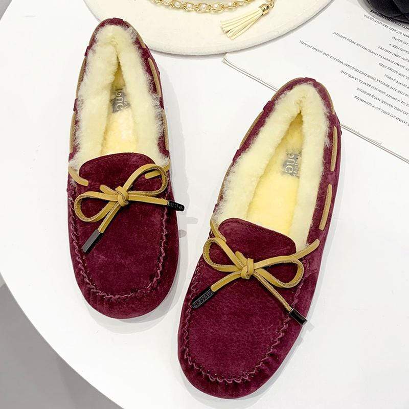 AuSnow UGG Ozsnow Premium Moccasin slippers for women with soft, plush interior and stylish moccasin design.
