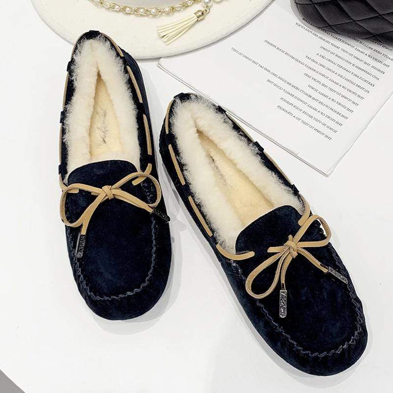 AuSnow UGG Ozsnow Premium Moccasin women's slippers in soft leather with plush lining and moccasin style, perfect for cozy comfort.