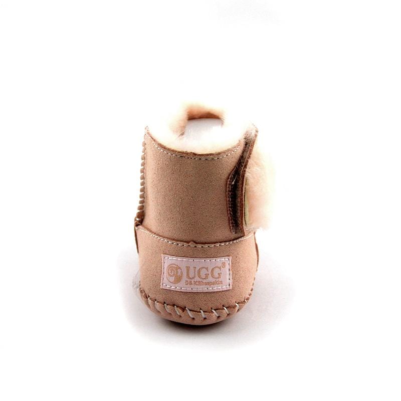 DK UGG stylish baby boots for kids, featuring cozy design and soft materials, perfect for little feet and fashionable winter wear.