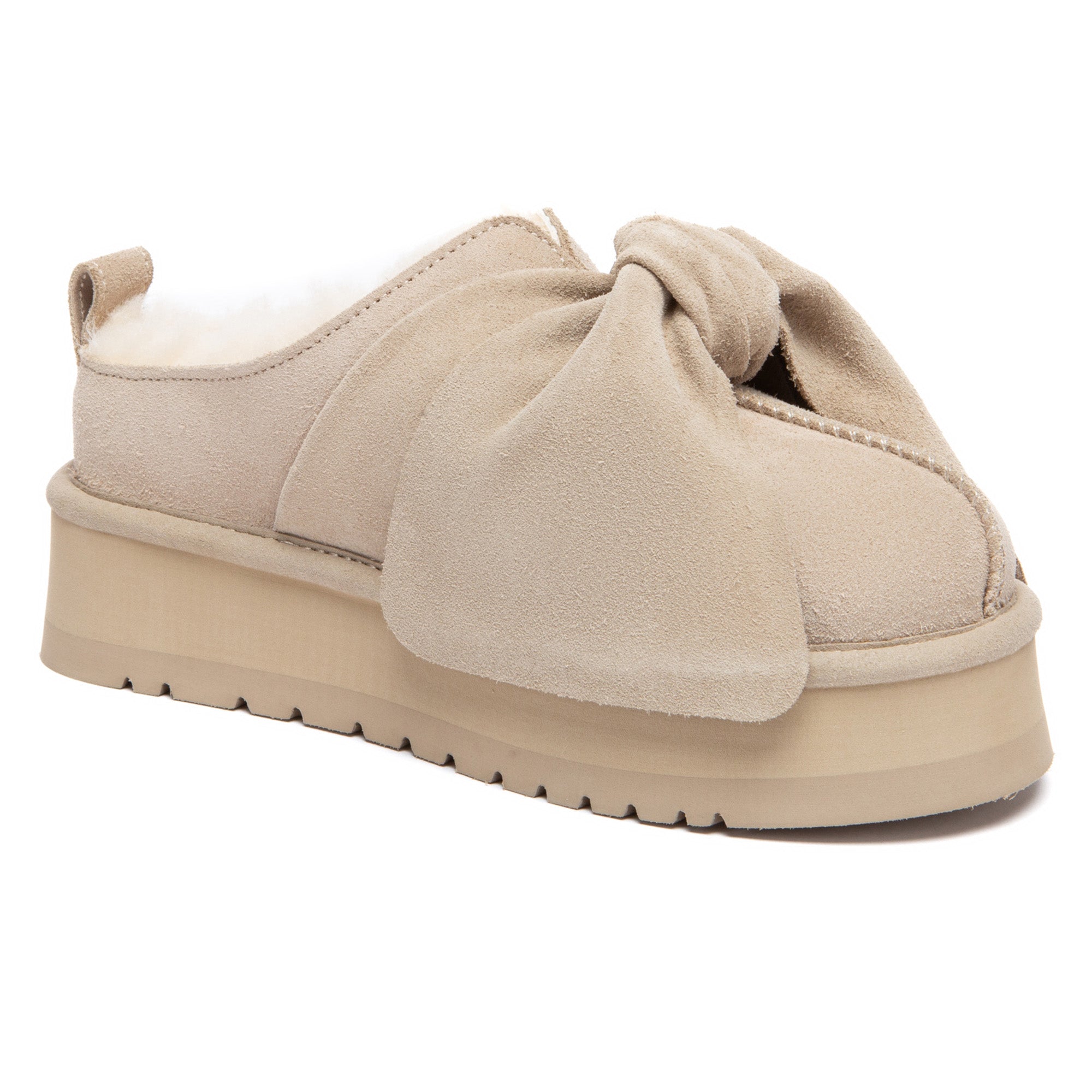 EverUgg Ultra Bow Platform UGG slippers featuring a plush design and a stylish bow on a soft slip-on style.