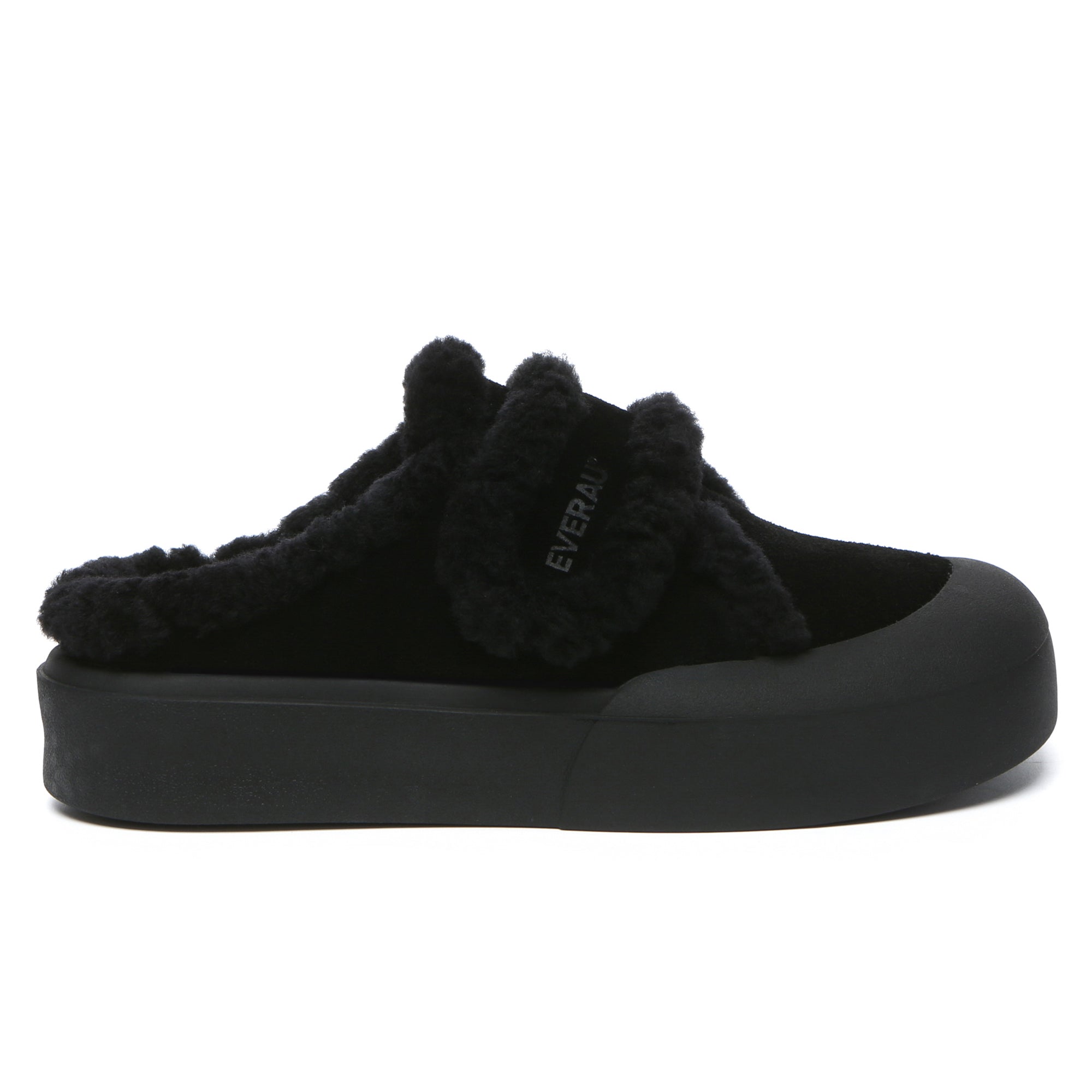 EverUgg women's adjustable shearling strap slippers with soft sheepskin lining and comfortable slide design.