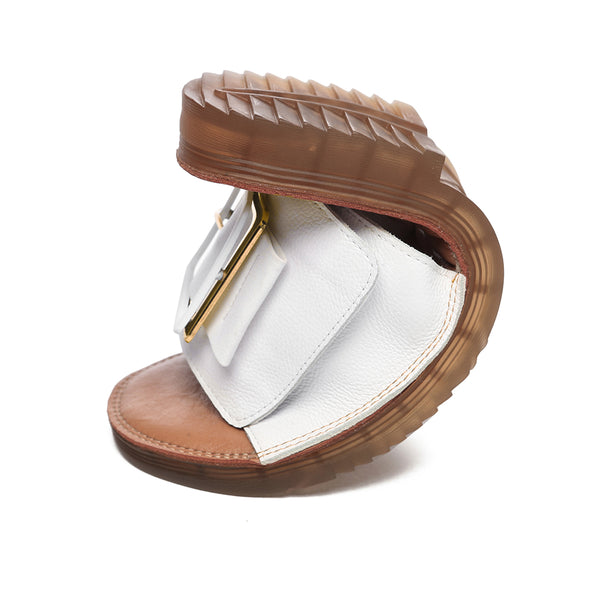 White Anni Ultra Soft Flat Slides by EverUgg, showing the comfortable flat sandals with a sleek design and soft material.