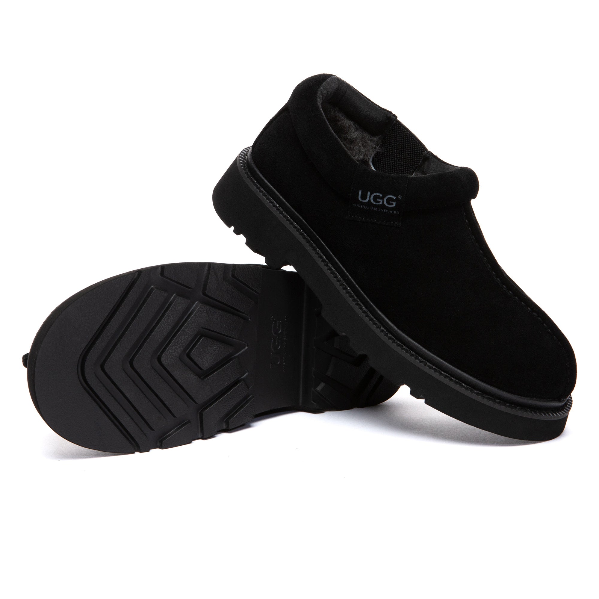 EverUgg Axton ankle UGG slippers with plush lining and tan suede exterior, designed for comfortable indoor wear.