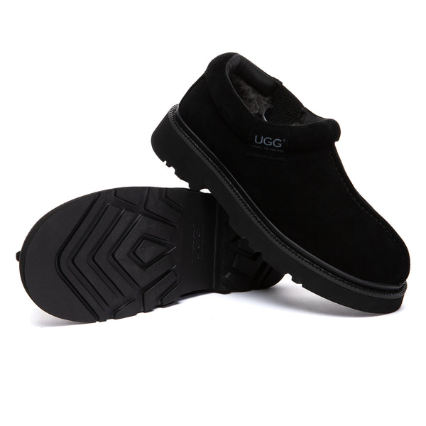EverUgg Axton ankle UGG slippers with plush lining and tan suede exterior, designed for comfortable indoor wear.