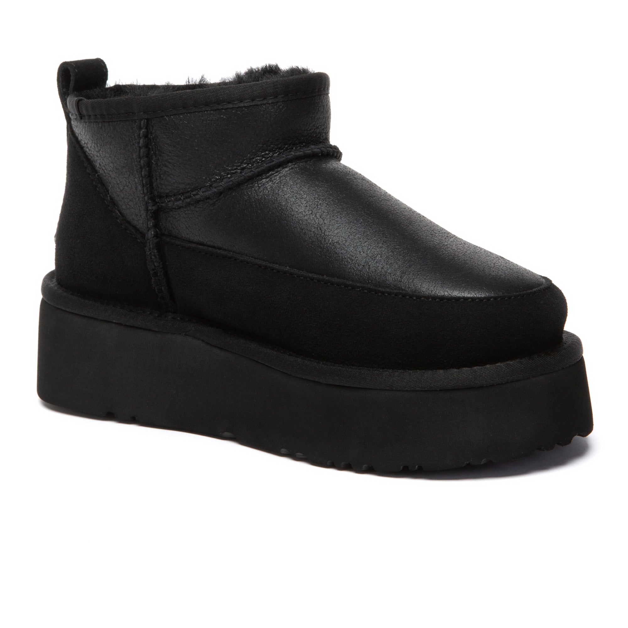EverUgg Earlova UGG boots in tan leather with plush shearling lining and rugged rubber sole, stylish and warm footwear.