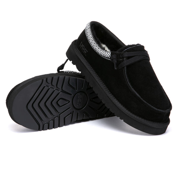 EverUgg Lace-Up Tazzy UGG slippers with soft material and lace-up design, shown in a cozy indoor setting.