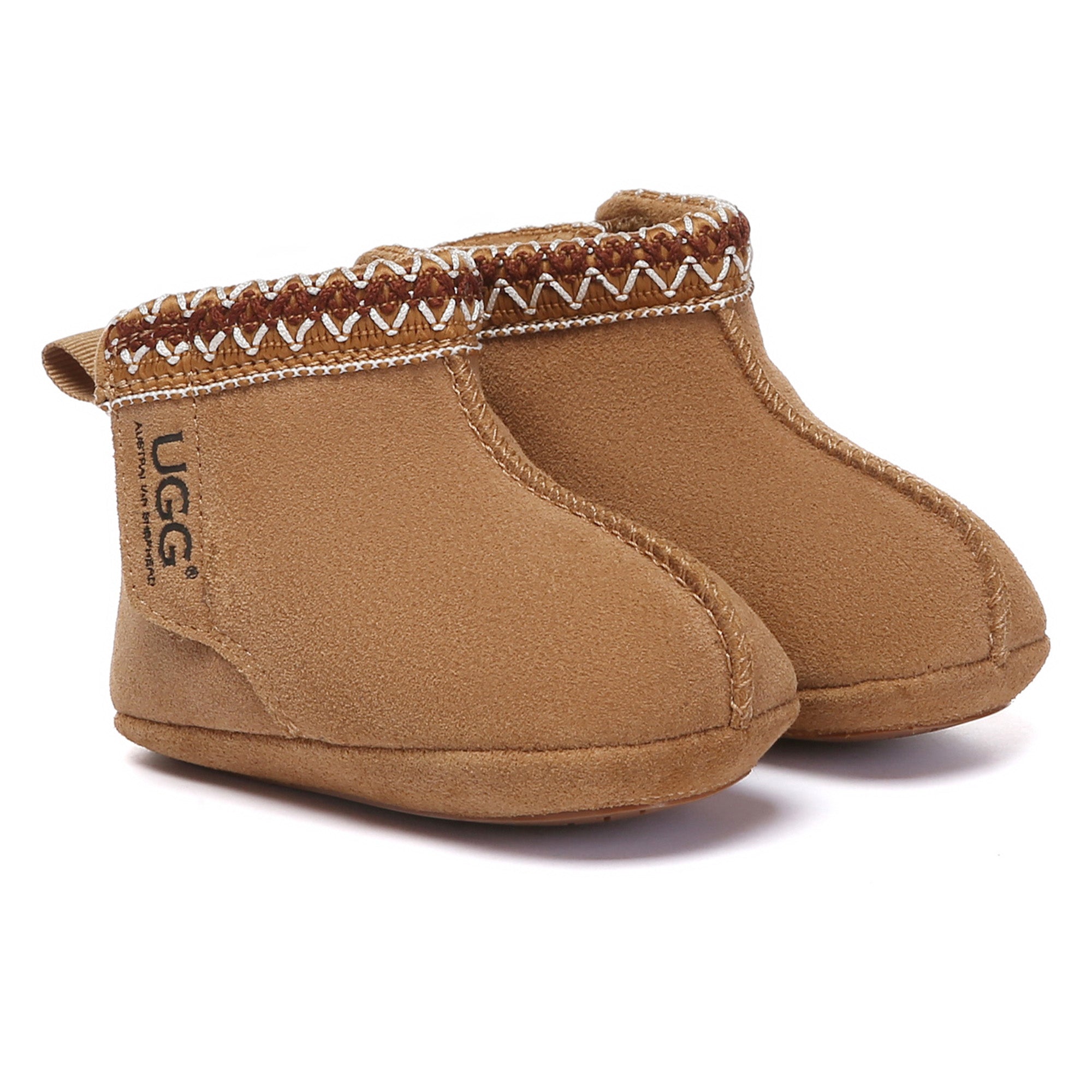 Baby UGG boots in a gift set by EverUgg, soft stitch design, cozy footwear for infants and toddlers, suitable for baby showers.